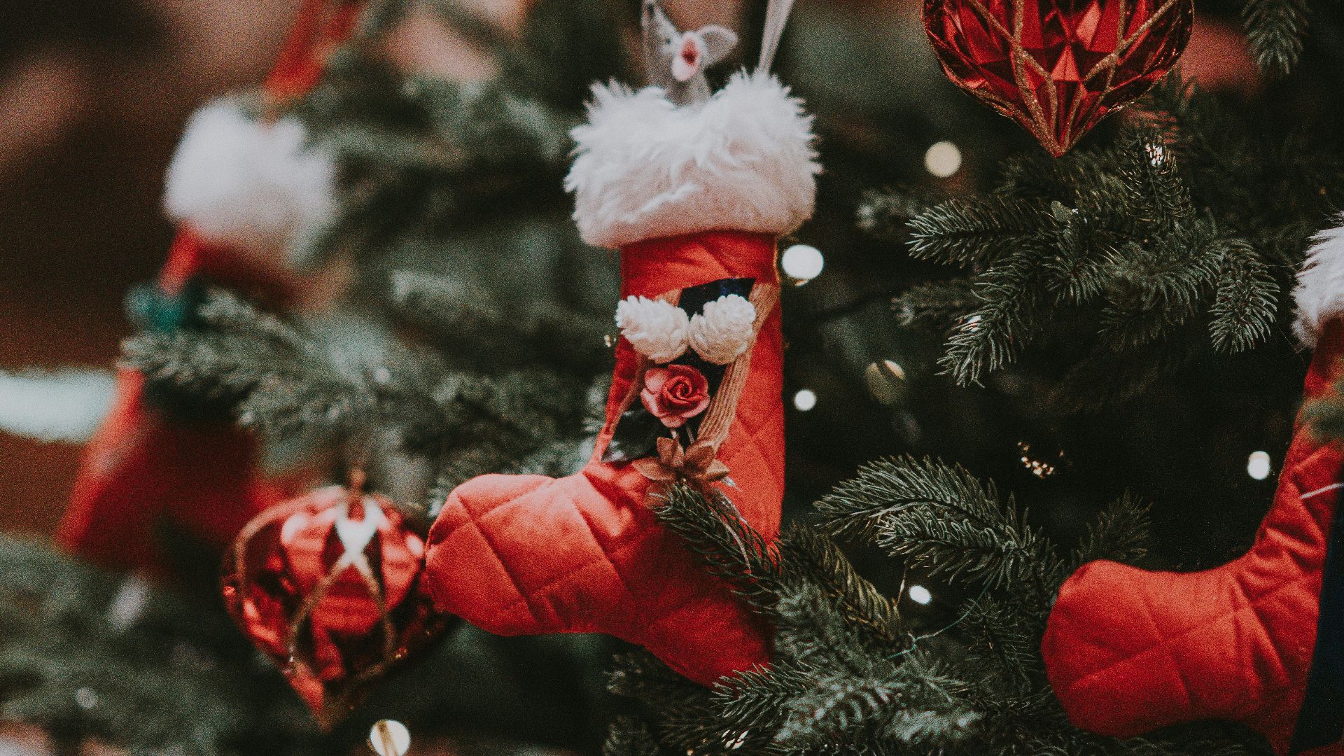 pre-lit Christmas tree with assorted Christmas tree ornaments