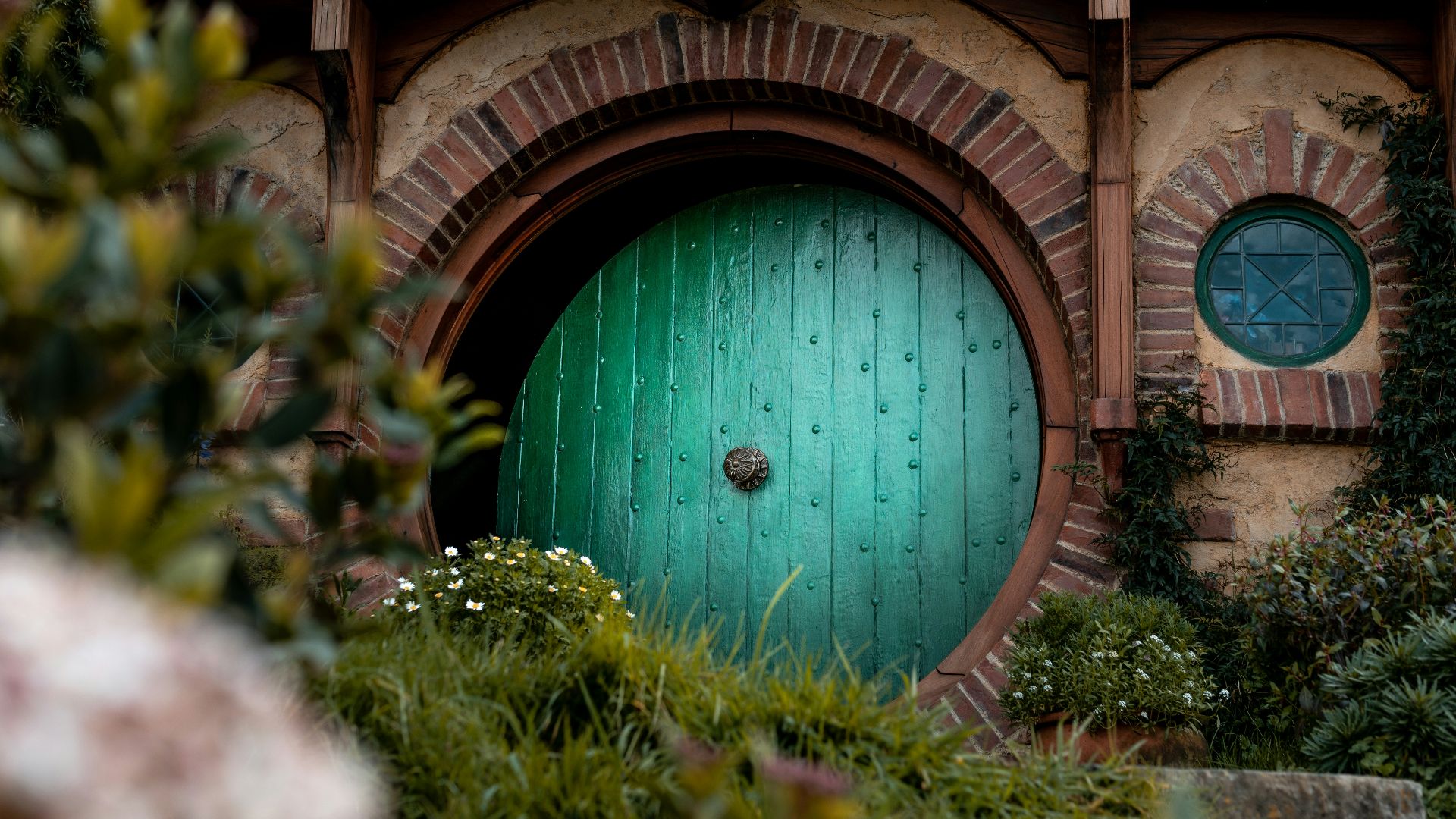 closed green wooden house