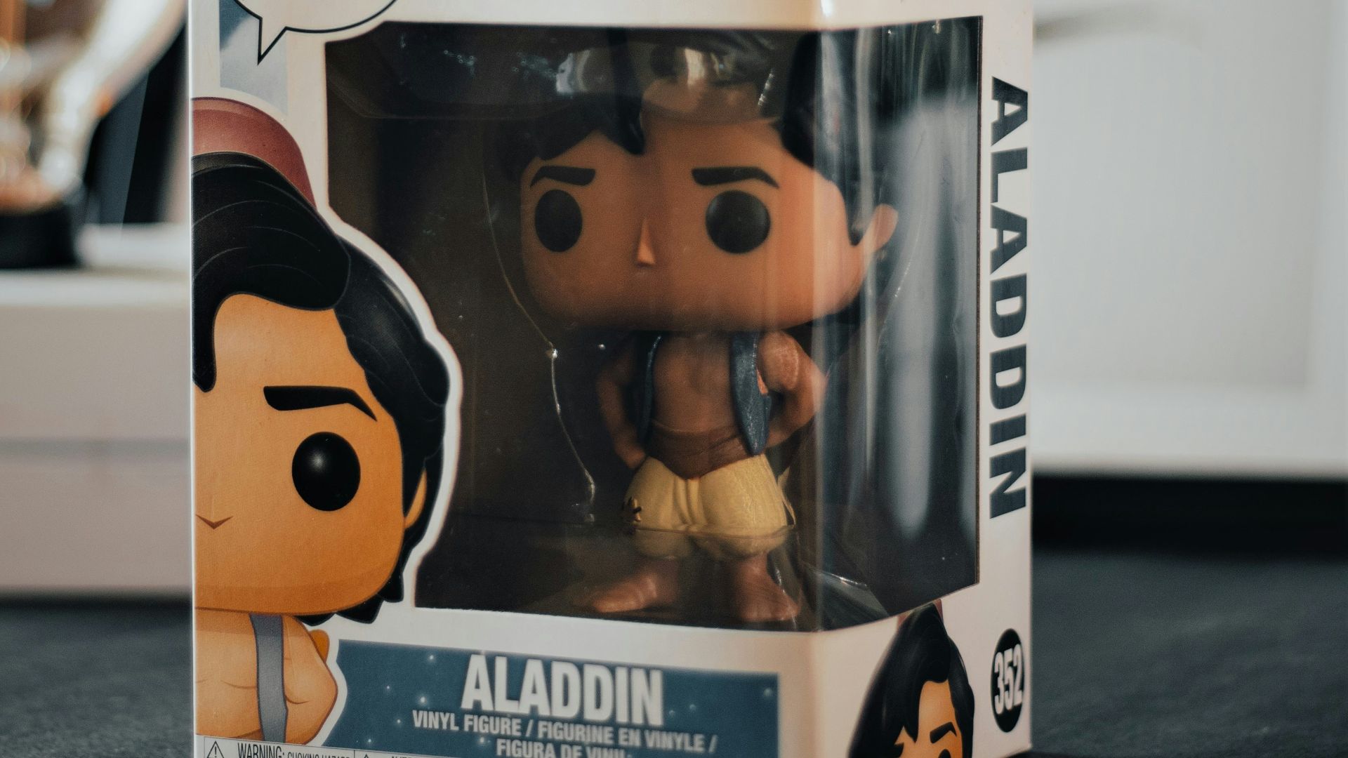 a box with a pop vinyl figure inside of it