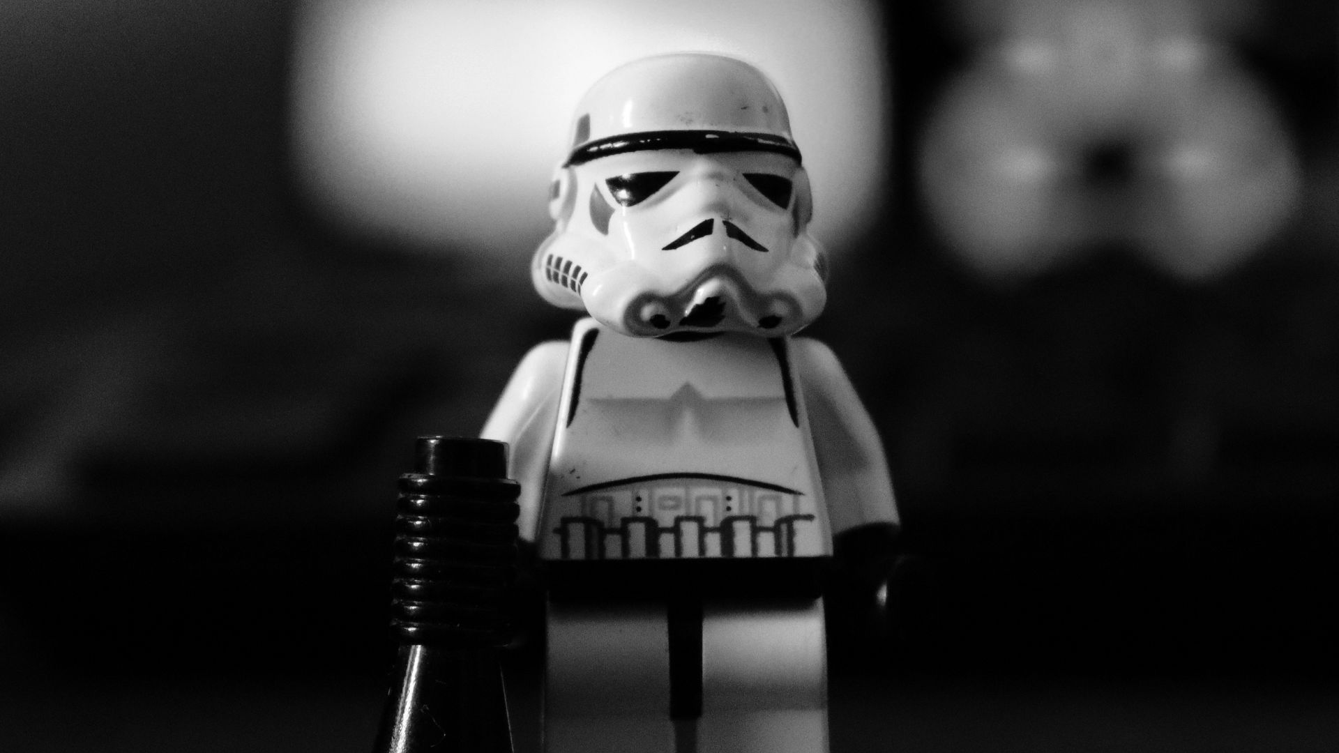 A black and white photo of a lego storm trooper