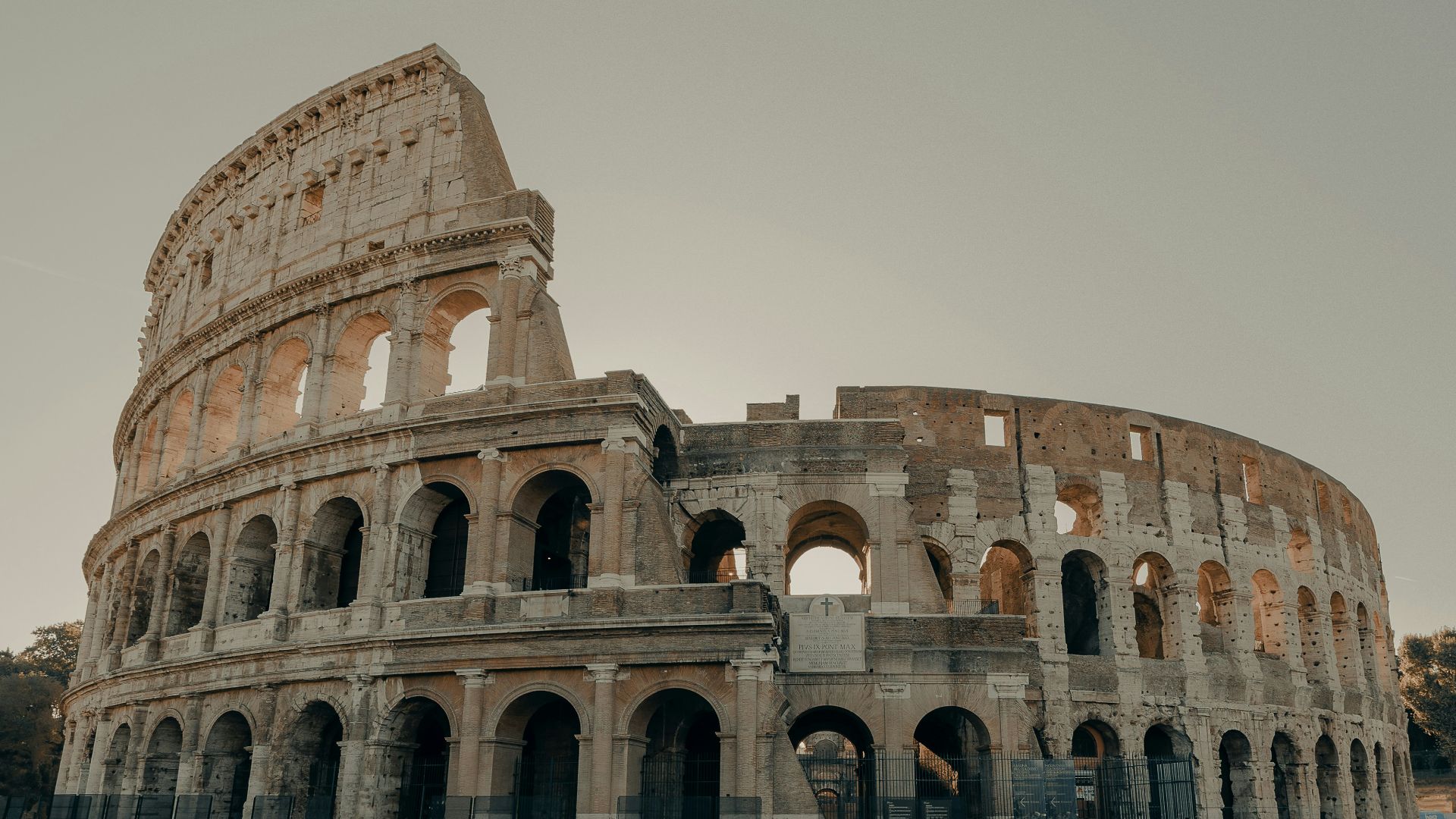 brown concrete building under gray sky during daytime