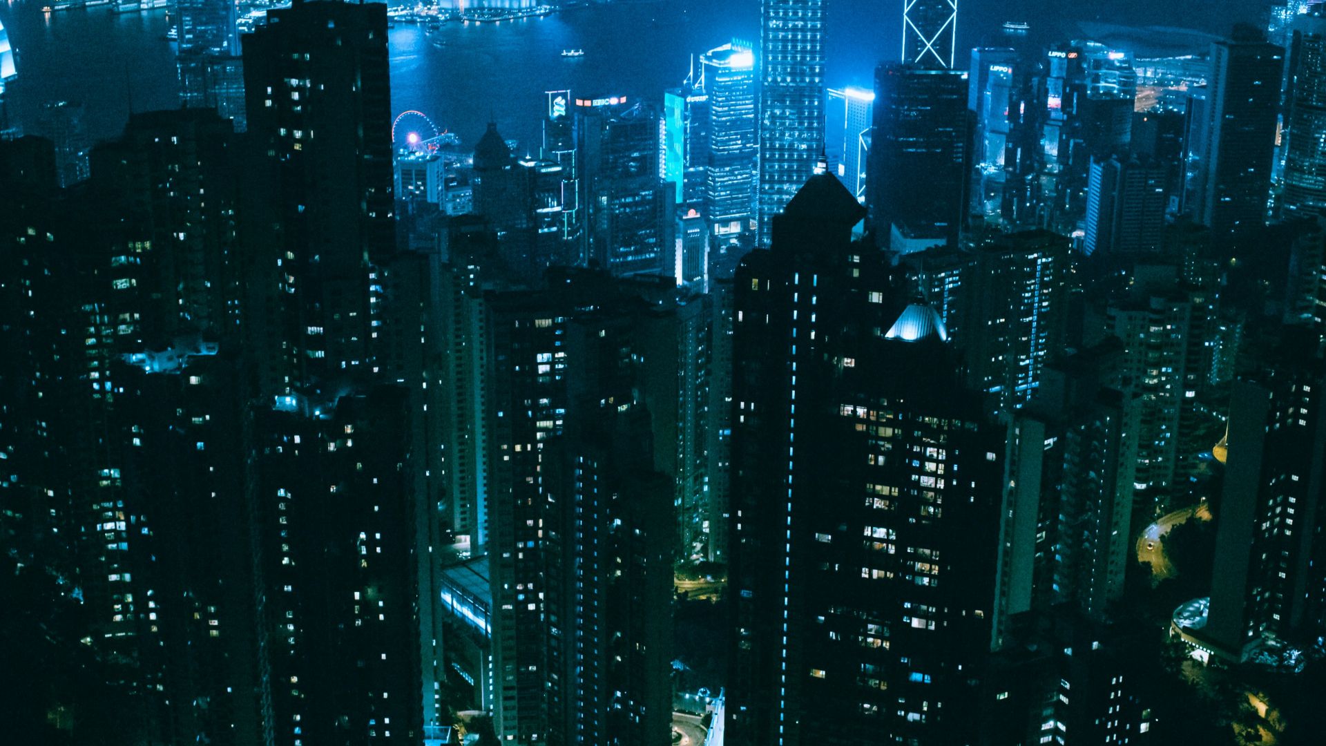 river surrounded with high-rise building during nighttime