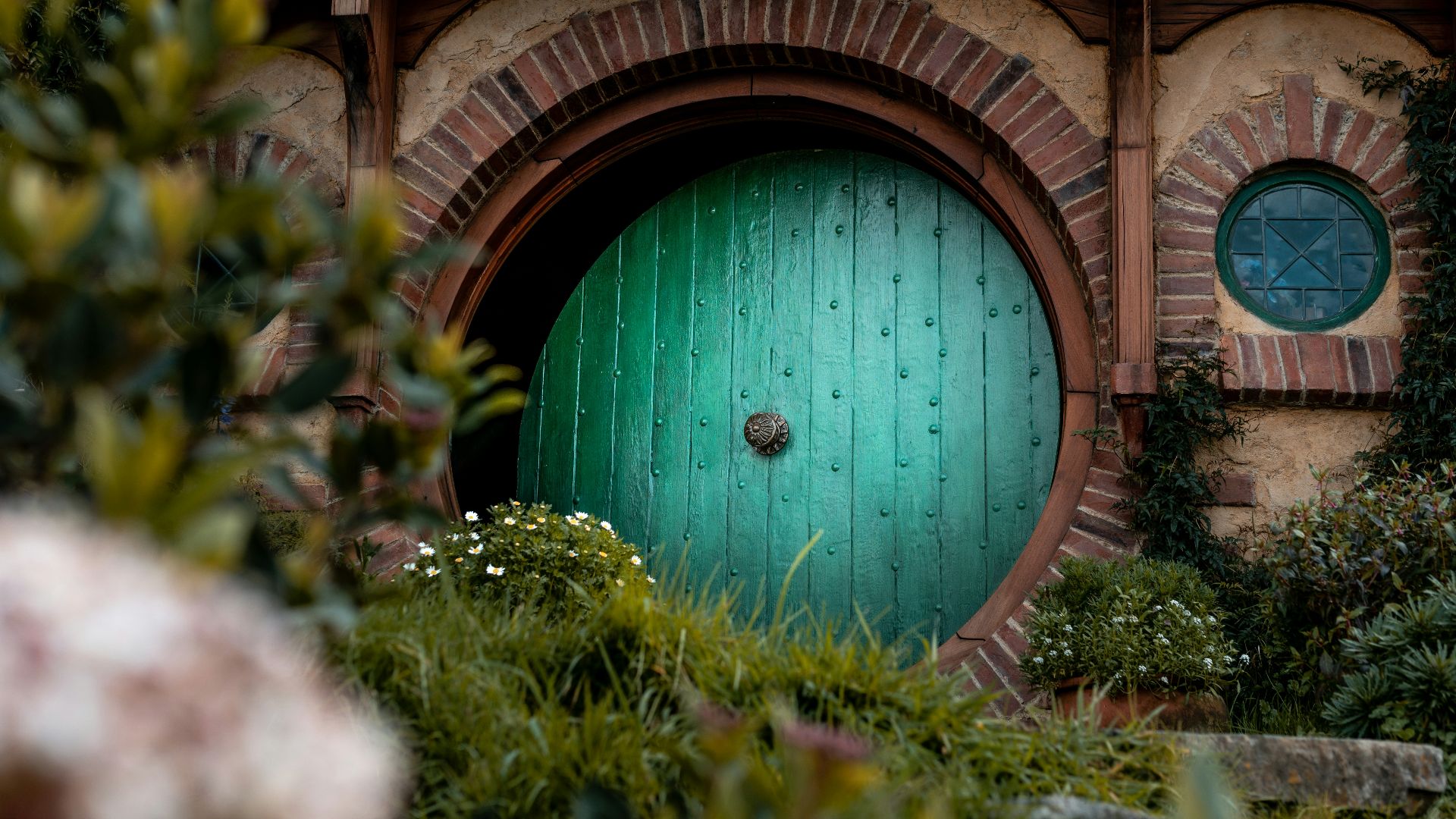 closed green wooden house