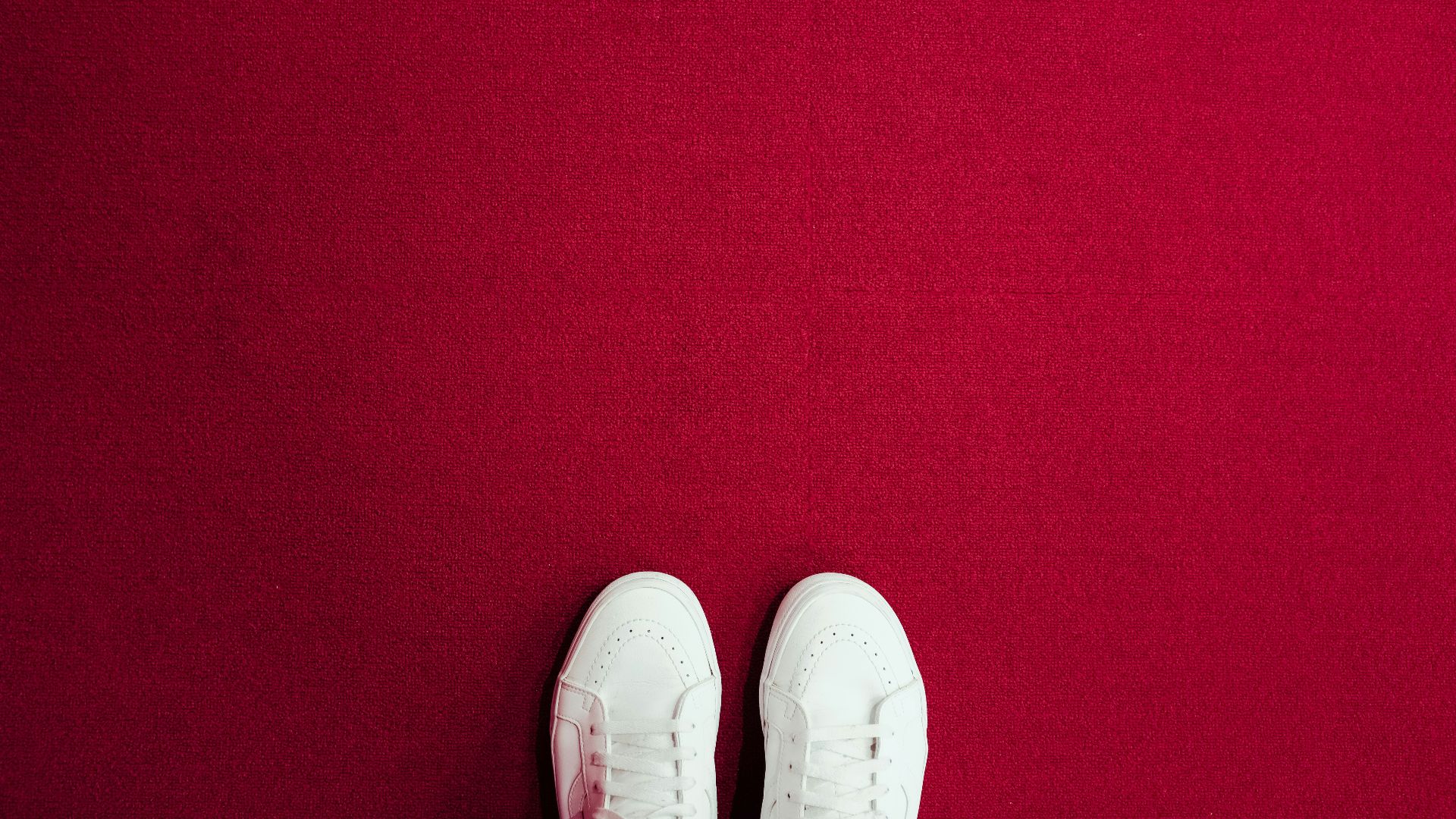 pair of white lace-up shoes
