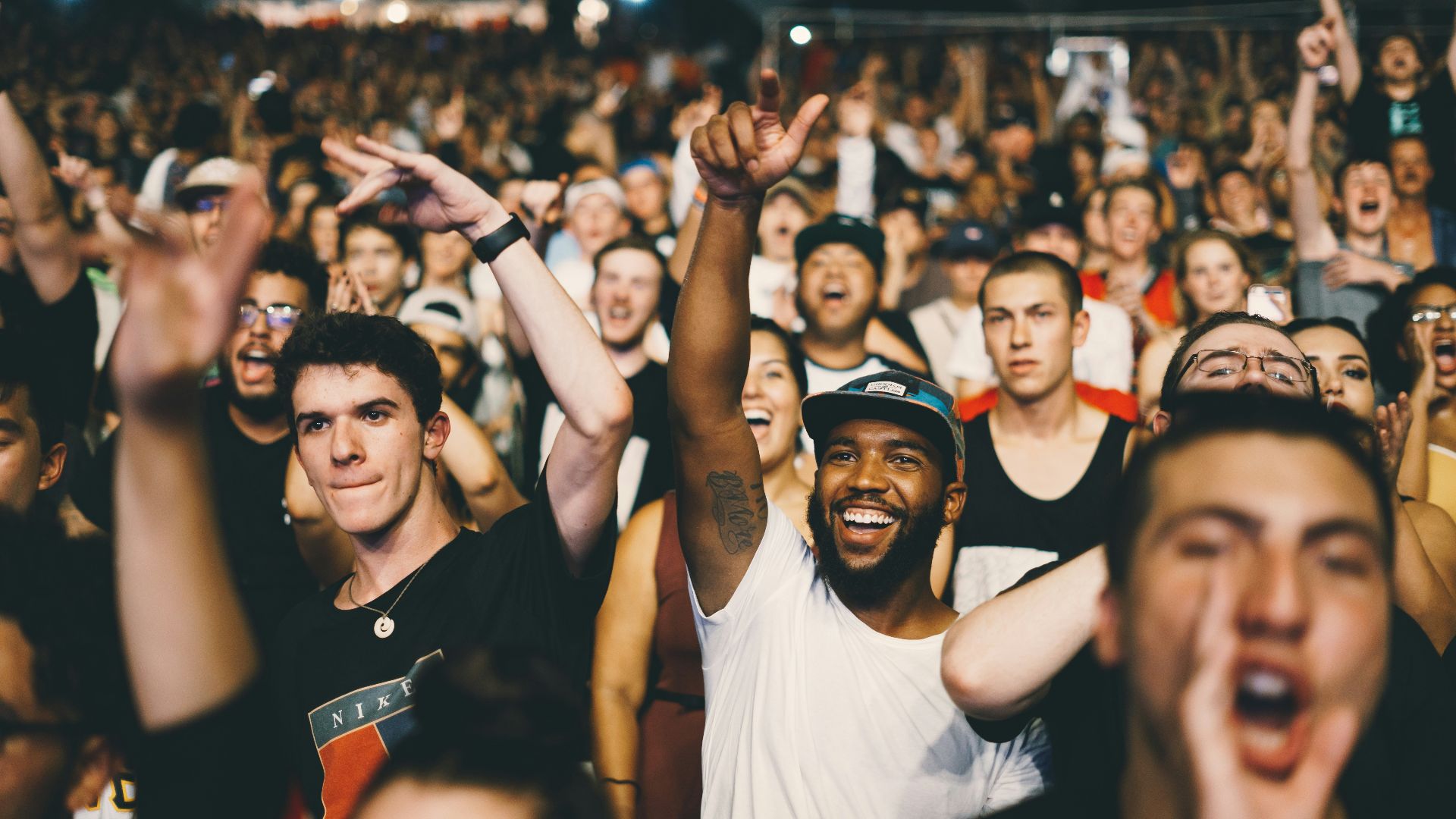 shallow focus photography of man in white shirt