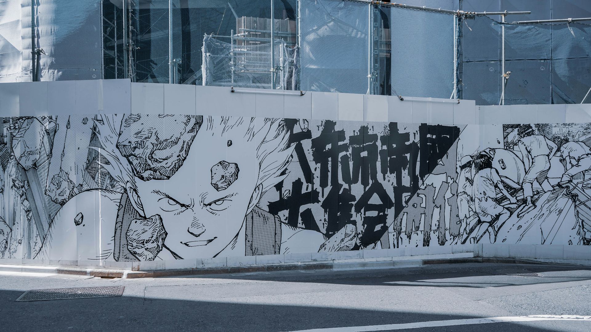 white and black graffiti on white wall