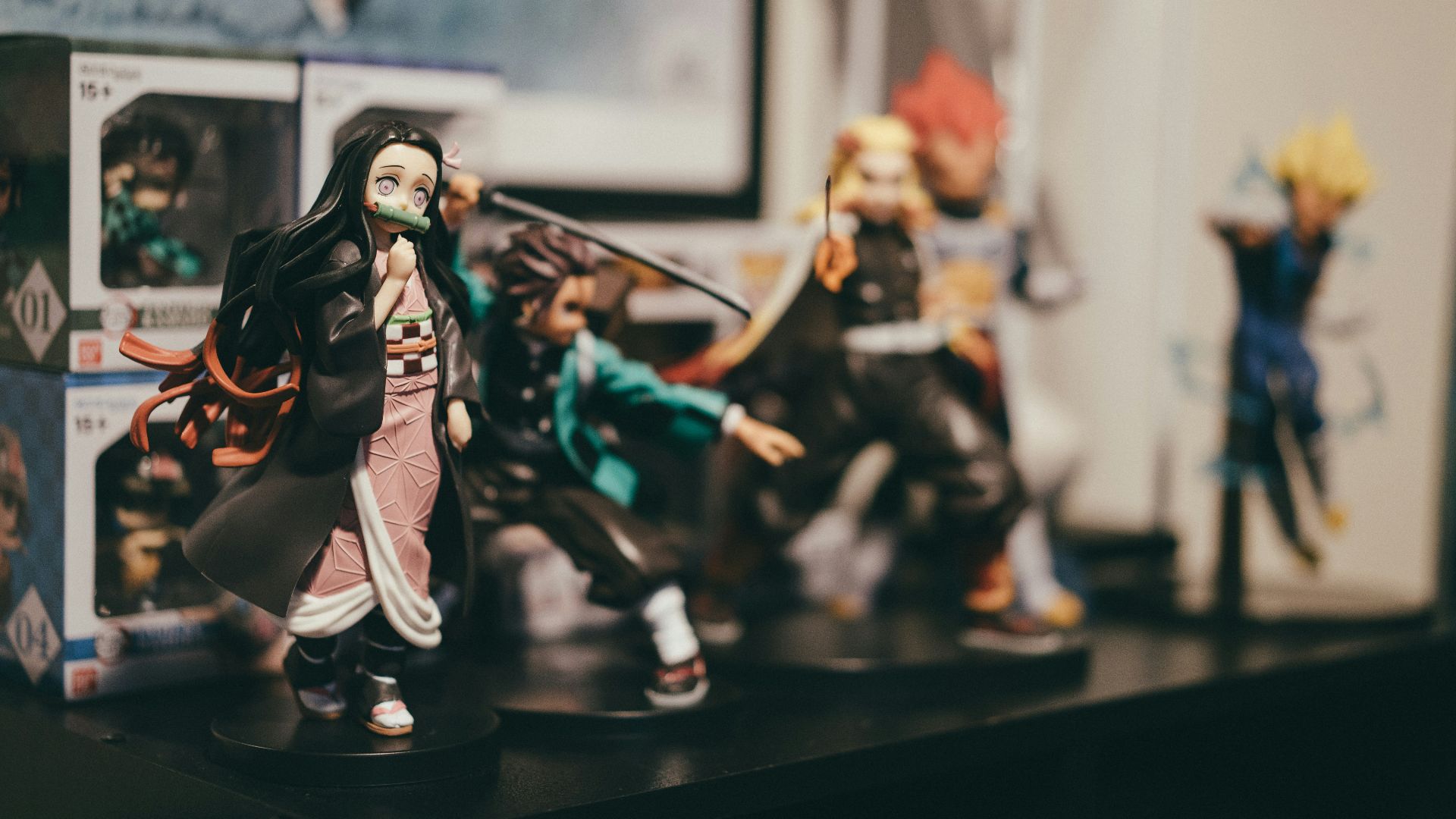 black haired woman in white and red dress figurine