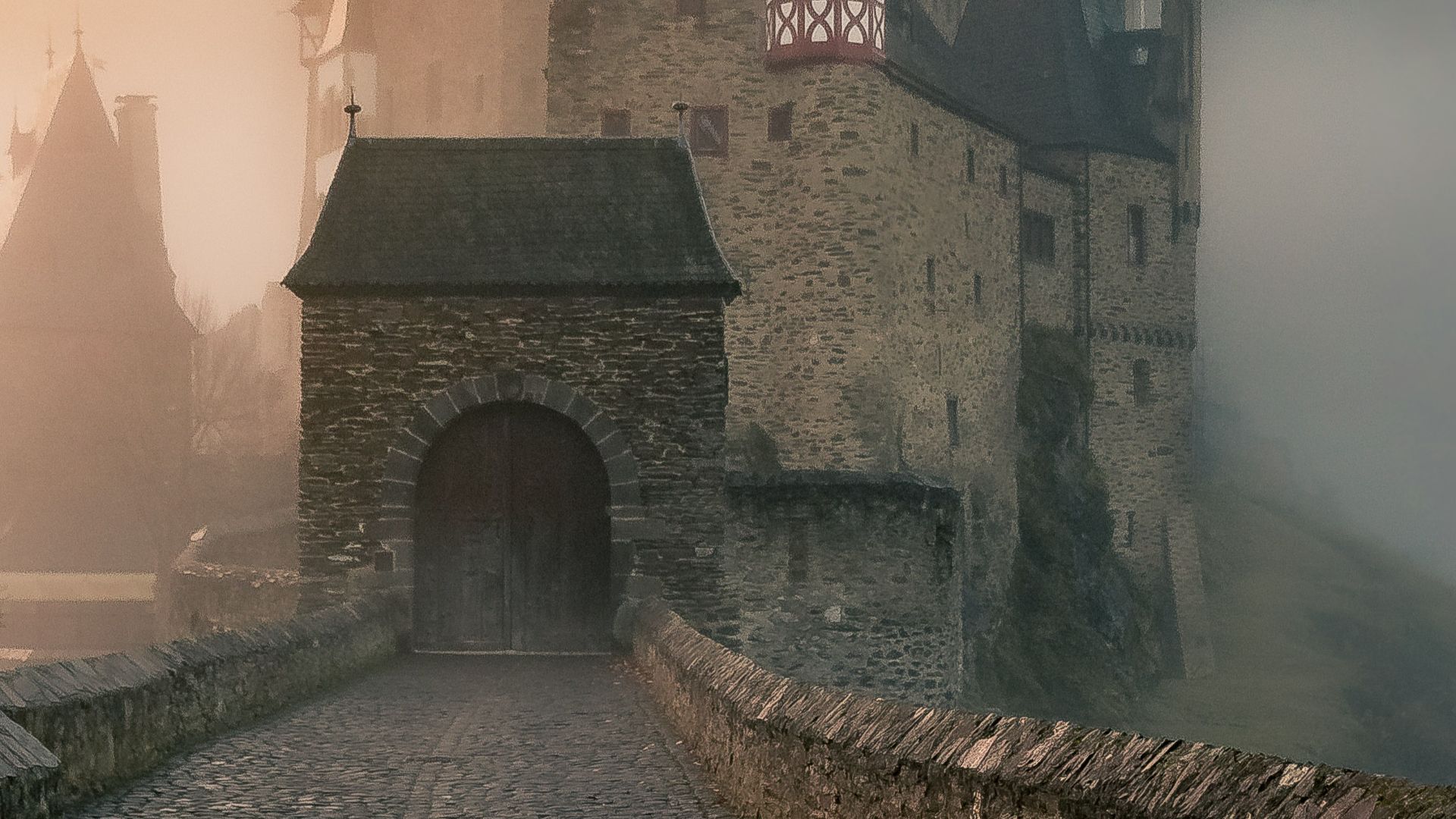 reflection of a castle surrounded with fogs