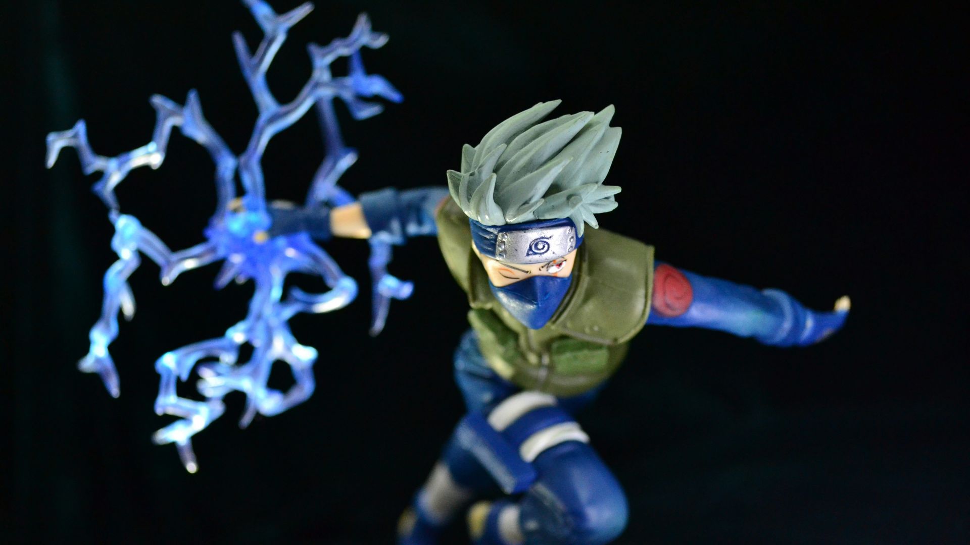 blue and yellow robot action figure