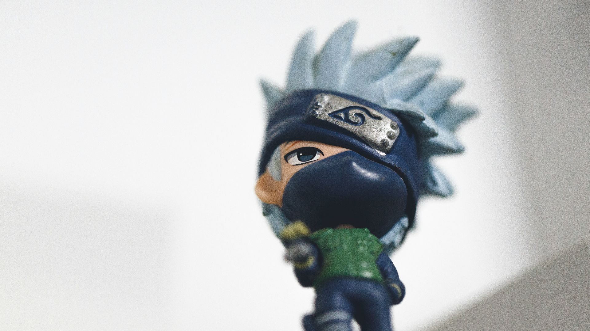 a figurine of a person with a hat on