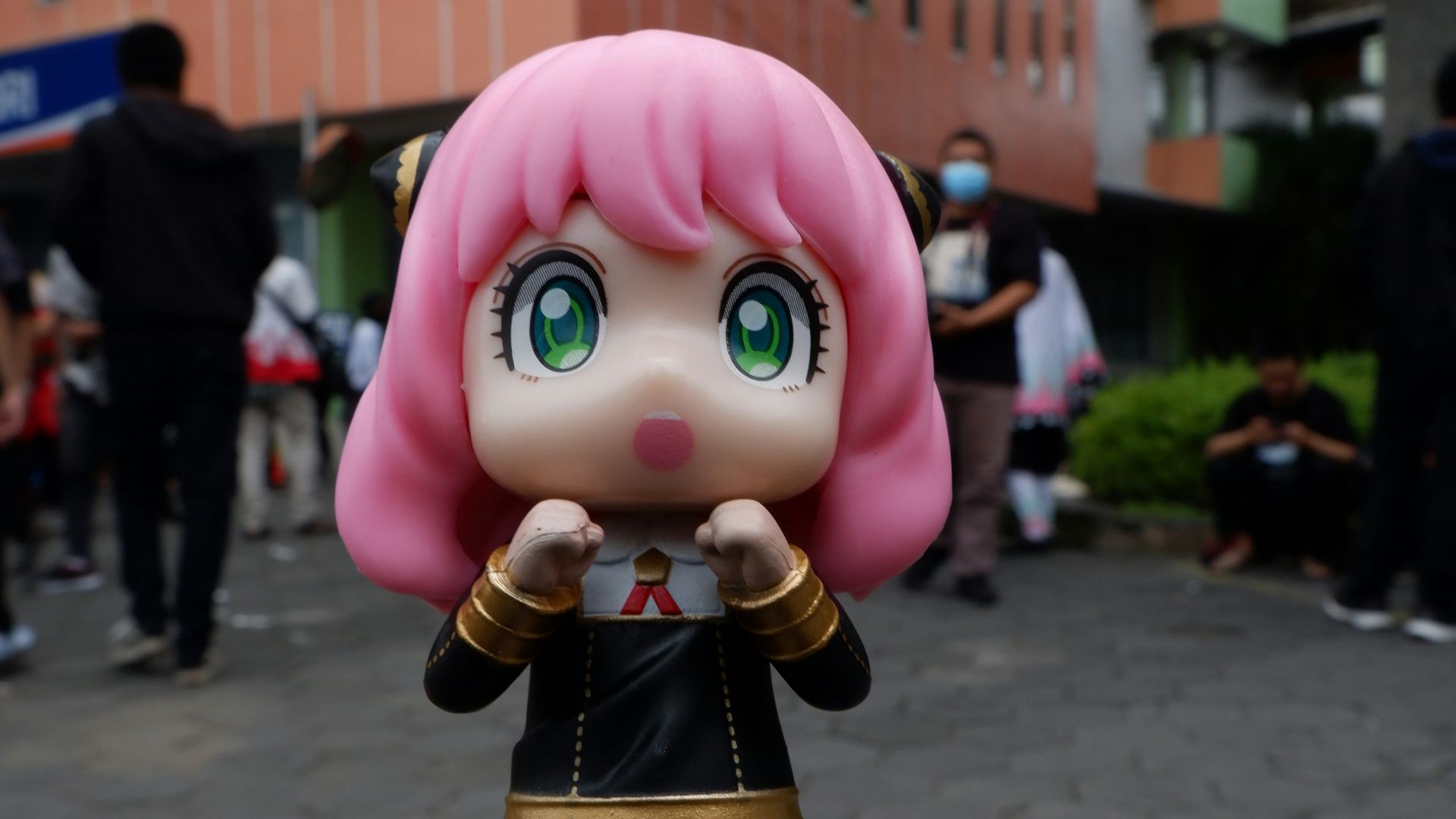 a close up of a figurine on a red object