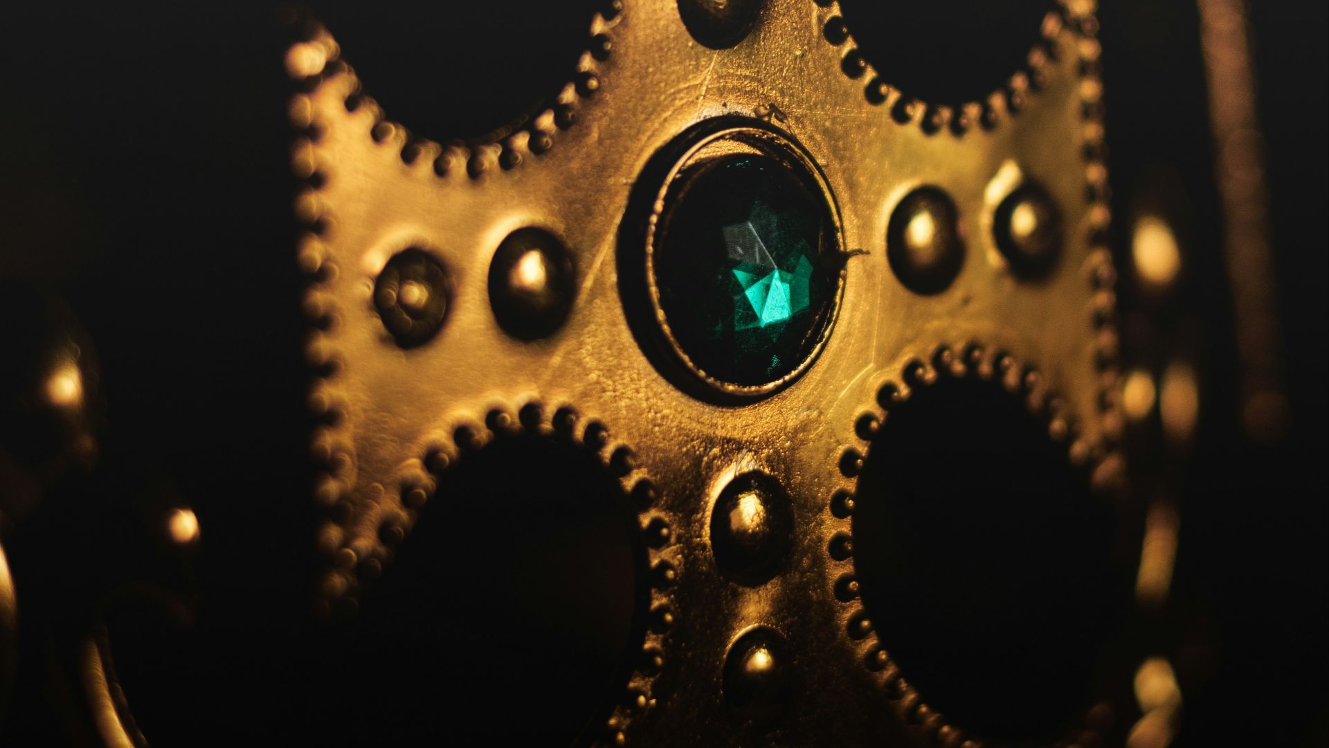 silver and green gemstone studded accessory