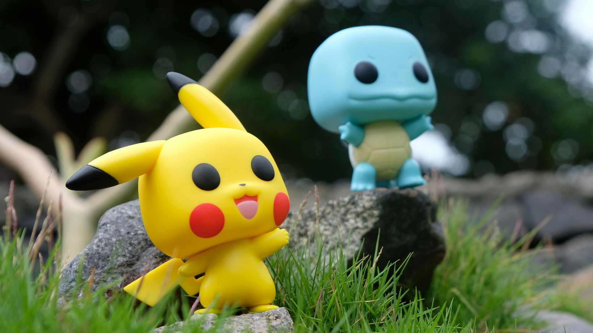 yellow and white duck plush toy on green grass during daytime