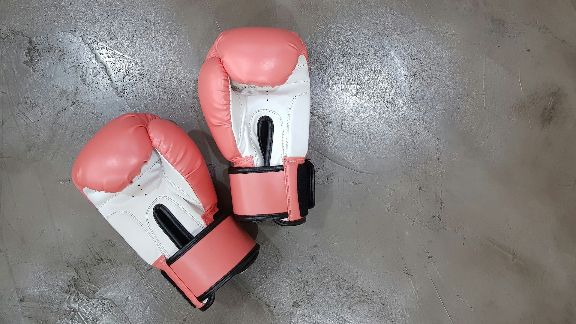 pair of pink boxing gloves
