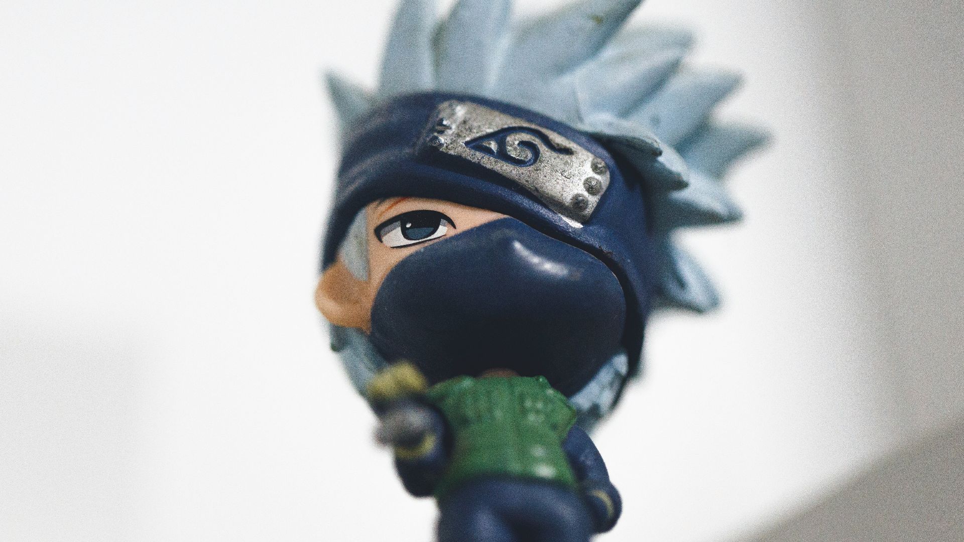 a figurine of a person with a hat on