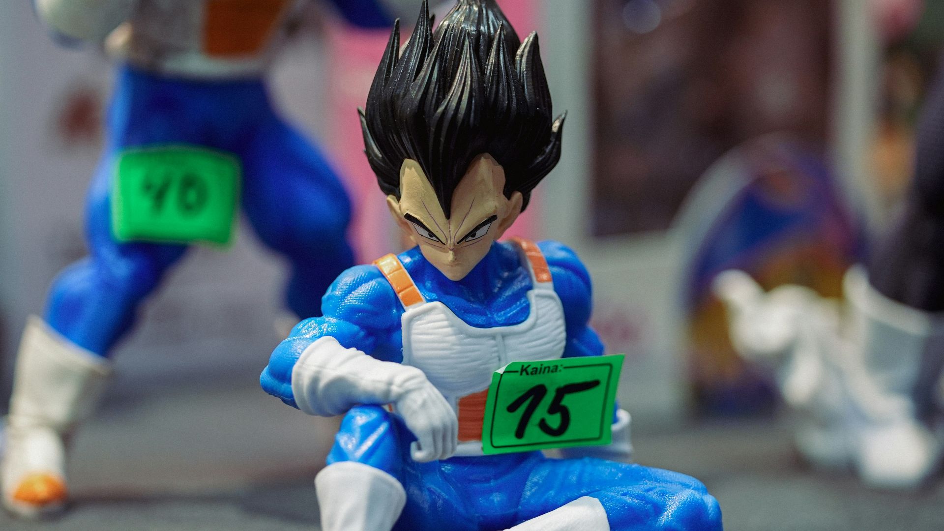 Vegeta figurines displayed on a table.