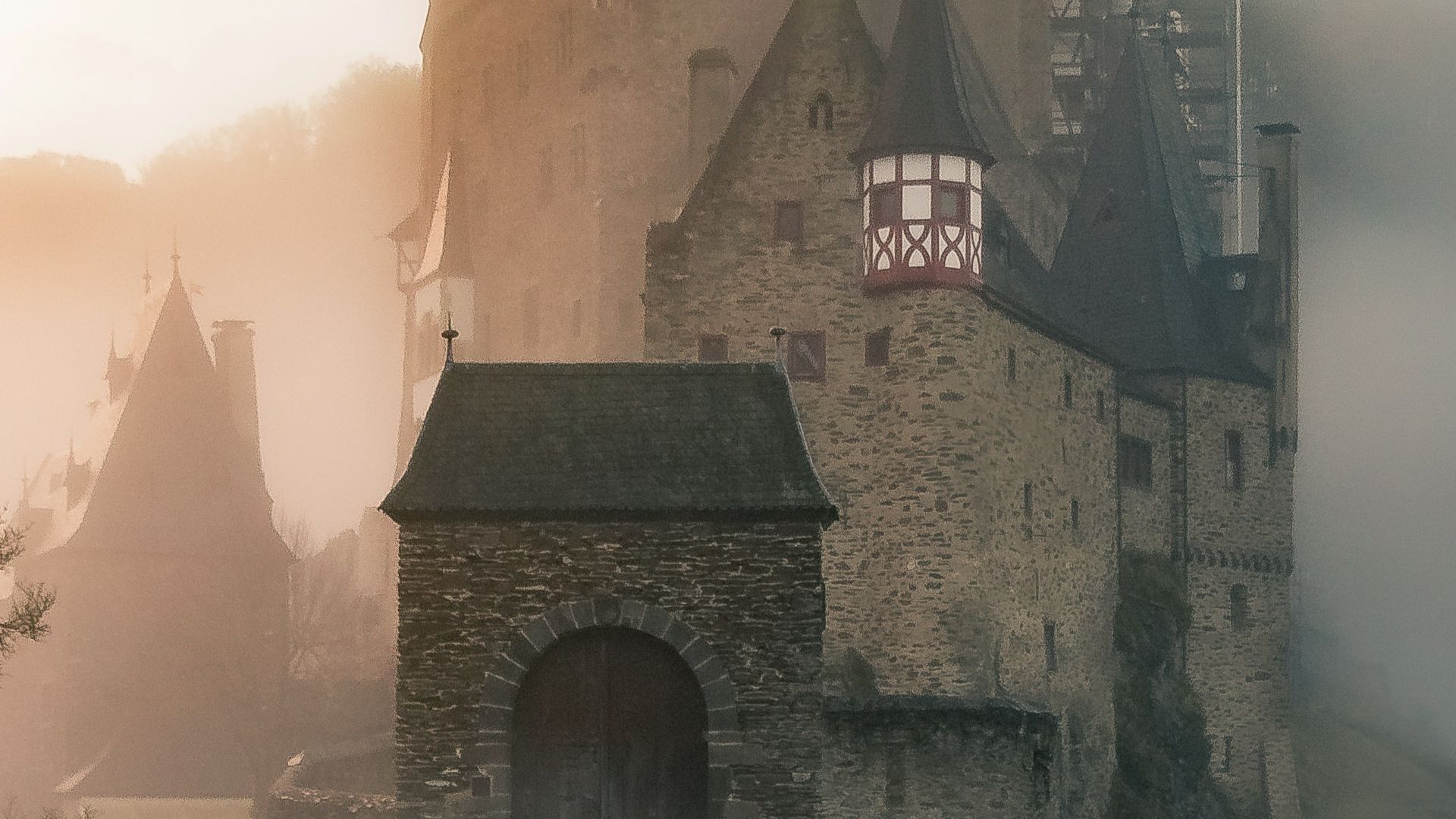 reflection of a castle surrounded with fogs