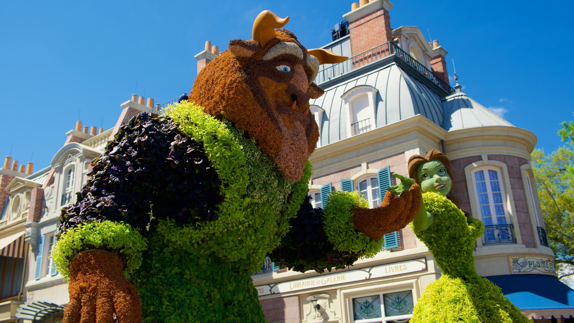 brown and white concrete building under blue sky during daytime