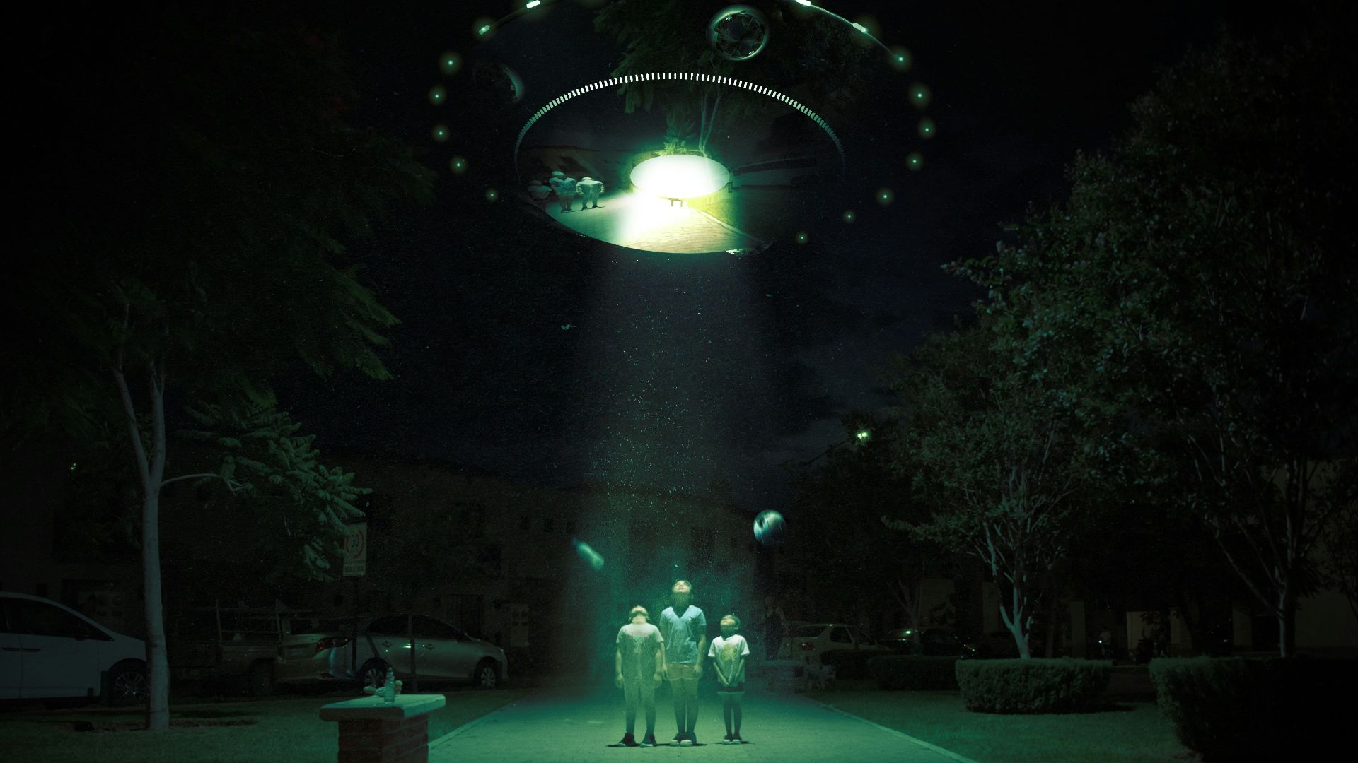 a group of people standing in front of a lighted archway