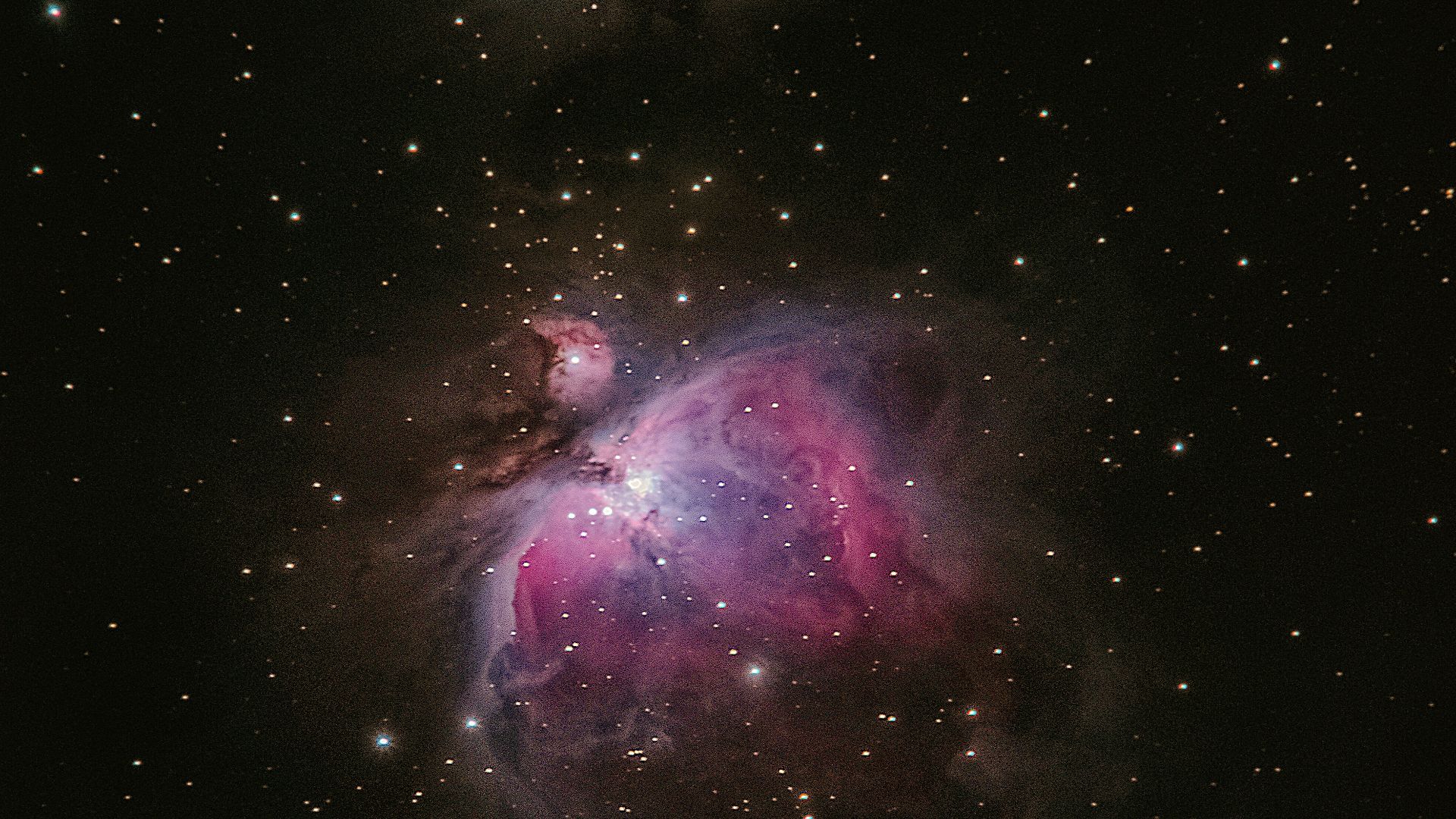 two stars in the middle of a black sky