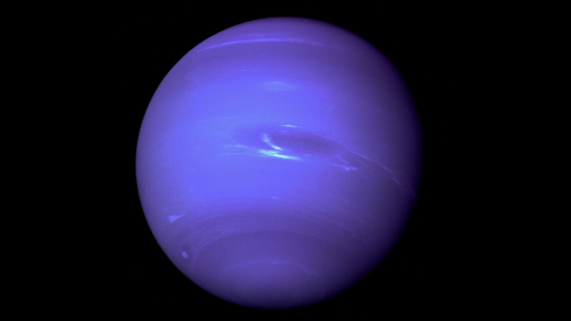 Neptune on a black background