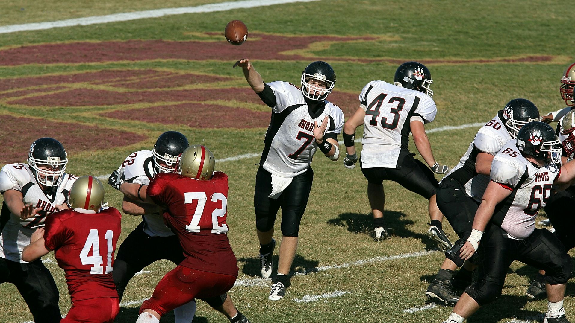 group of men playing football