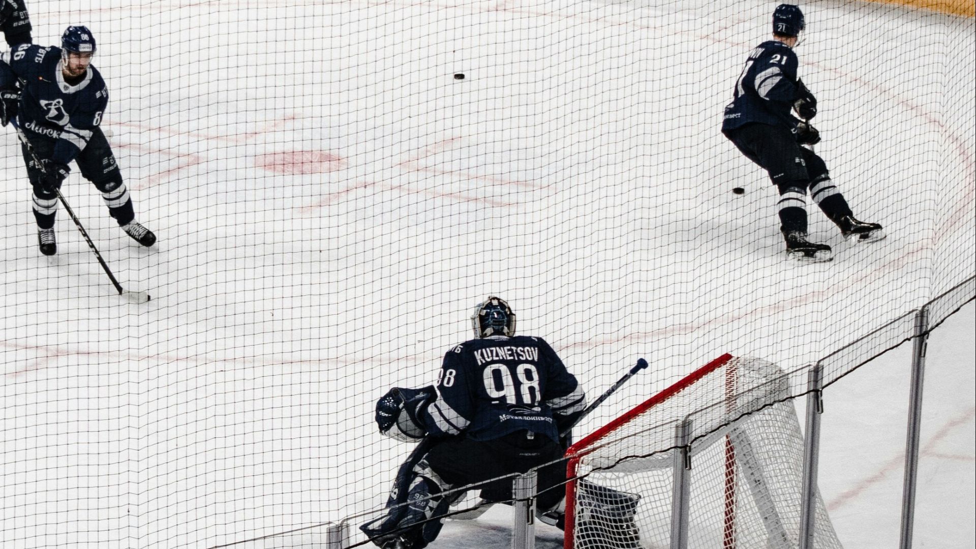 ice hockey players on ice hockey field