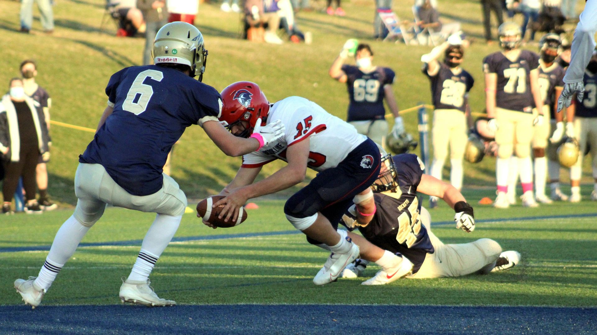 a group of people playing a game of football