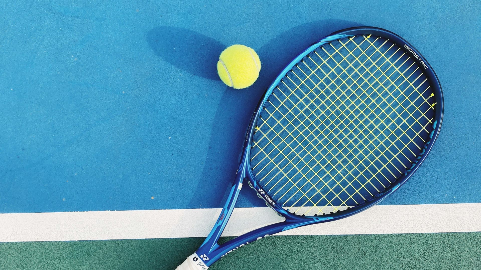 white and blue tennis racket