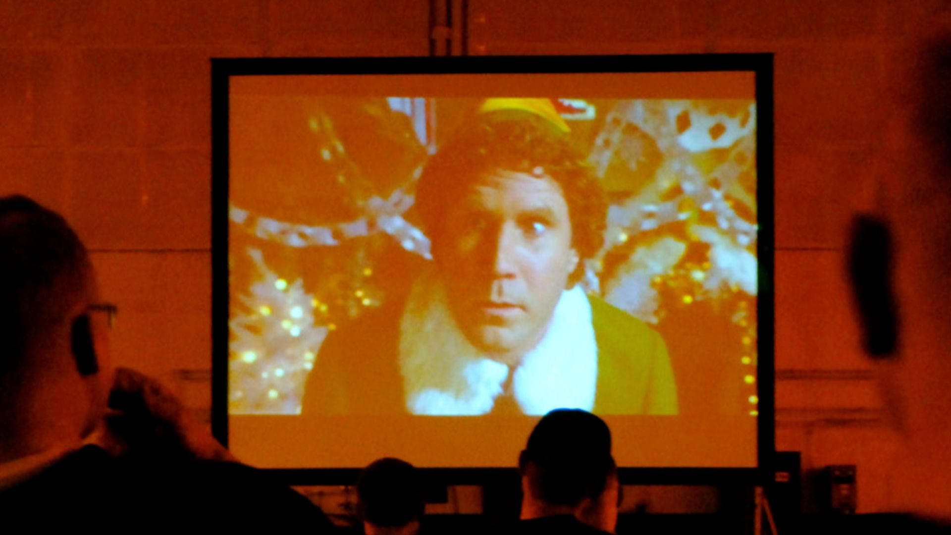 File:US Navy 061217-N-0336C-052 Sailors relax while watching the Christmas movie.jpg