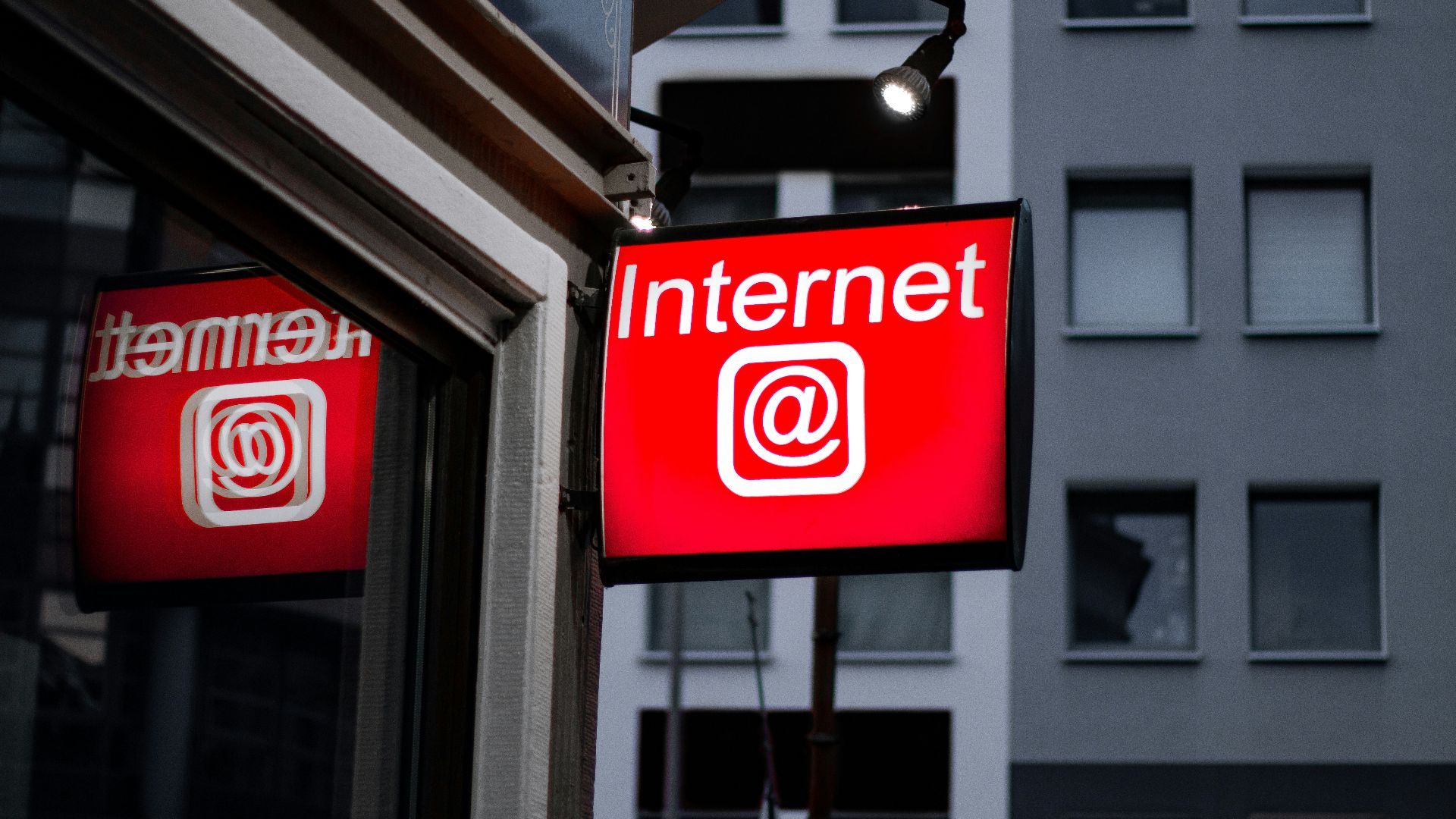 Internet LED signage beside building near buildings