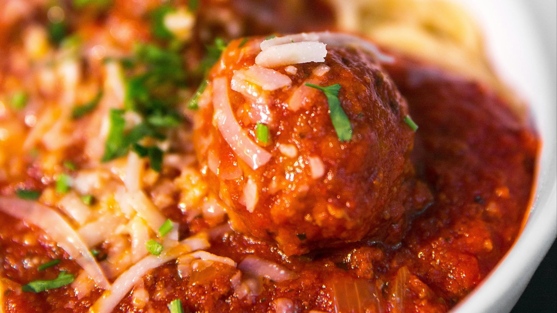 meta balls with noodles served on white ceramic bowl