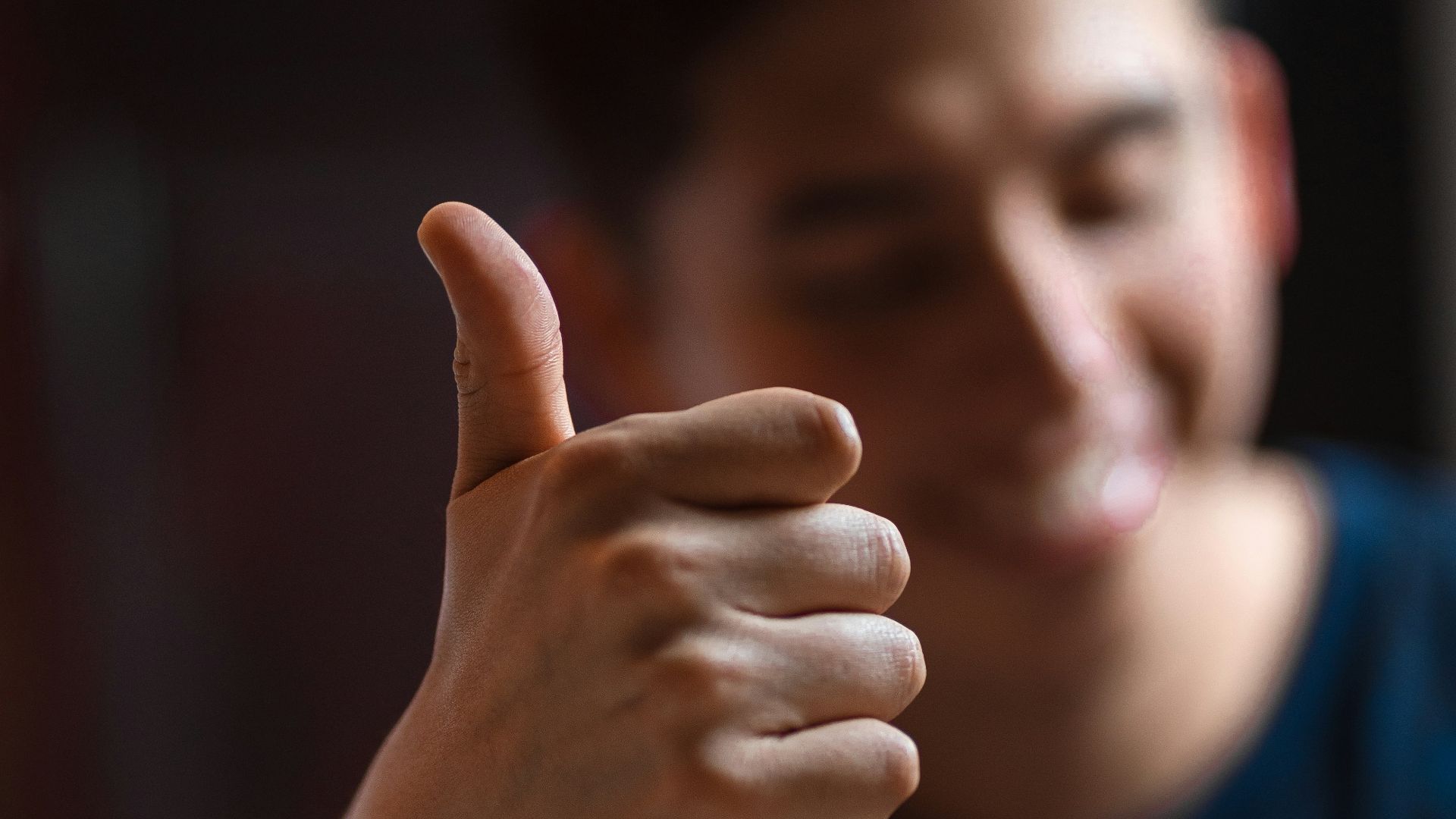 man wearing blue crew-neck shirt