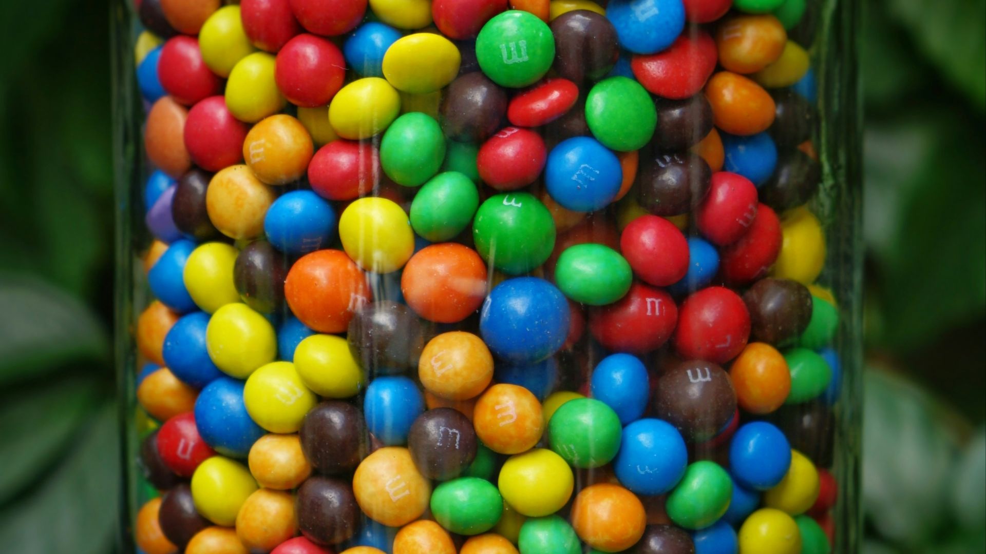 jar of M&M's coated chocolates