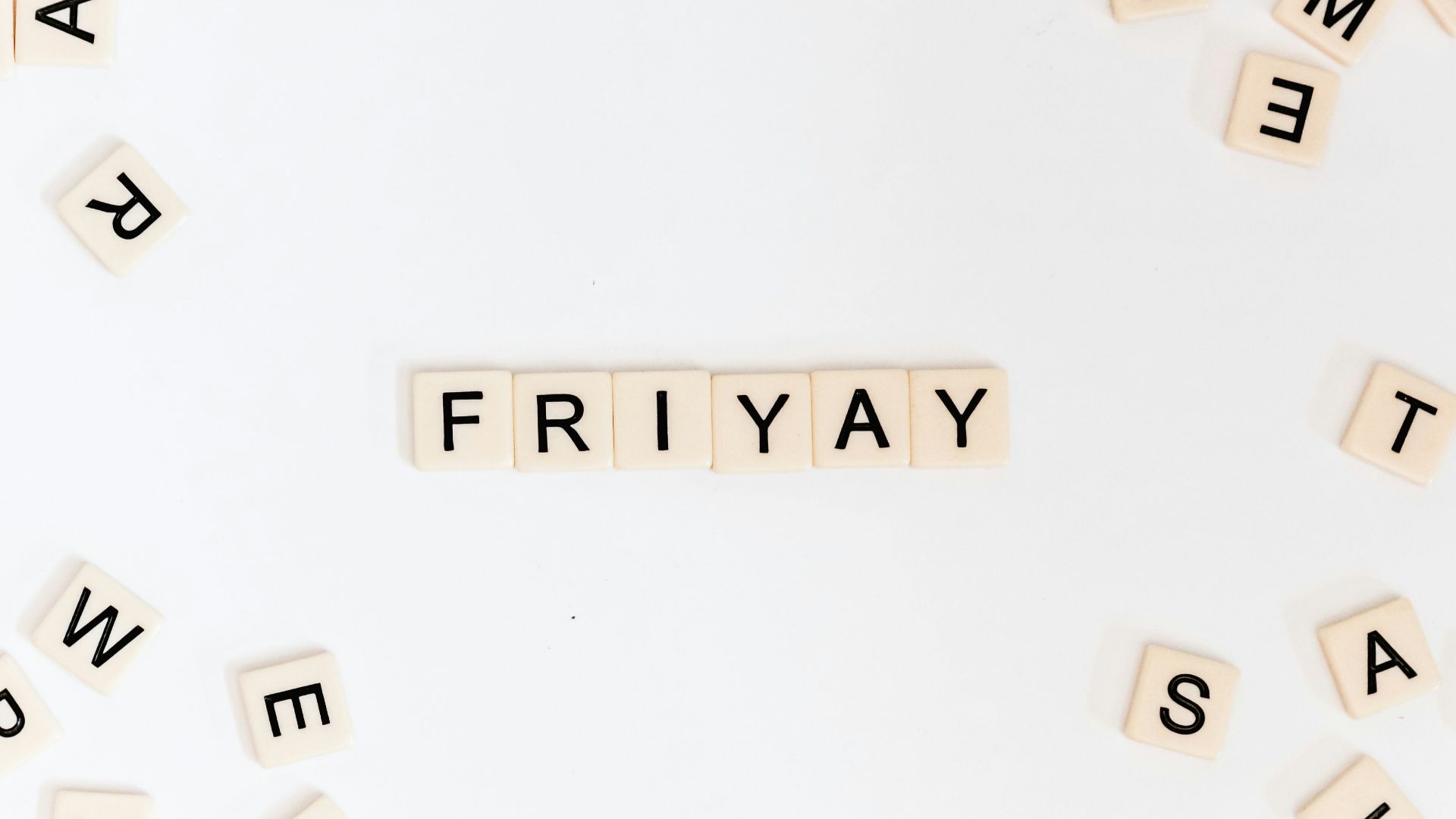 Friyay scrabble pieces on white surface