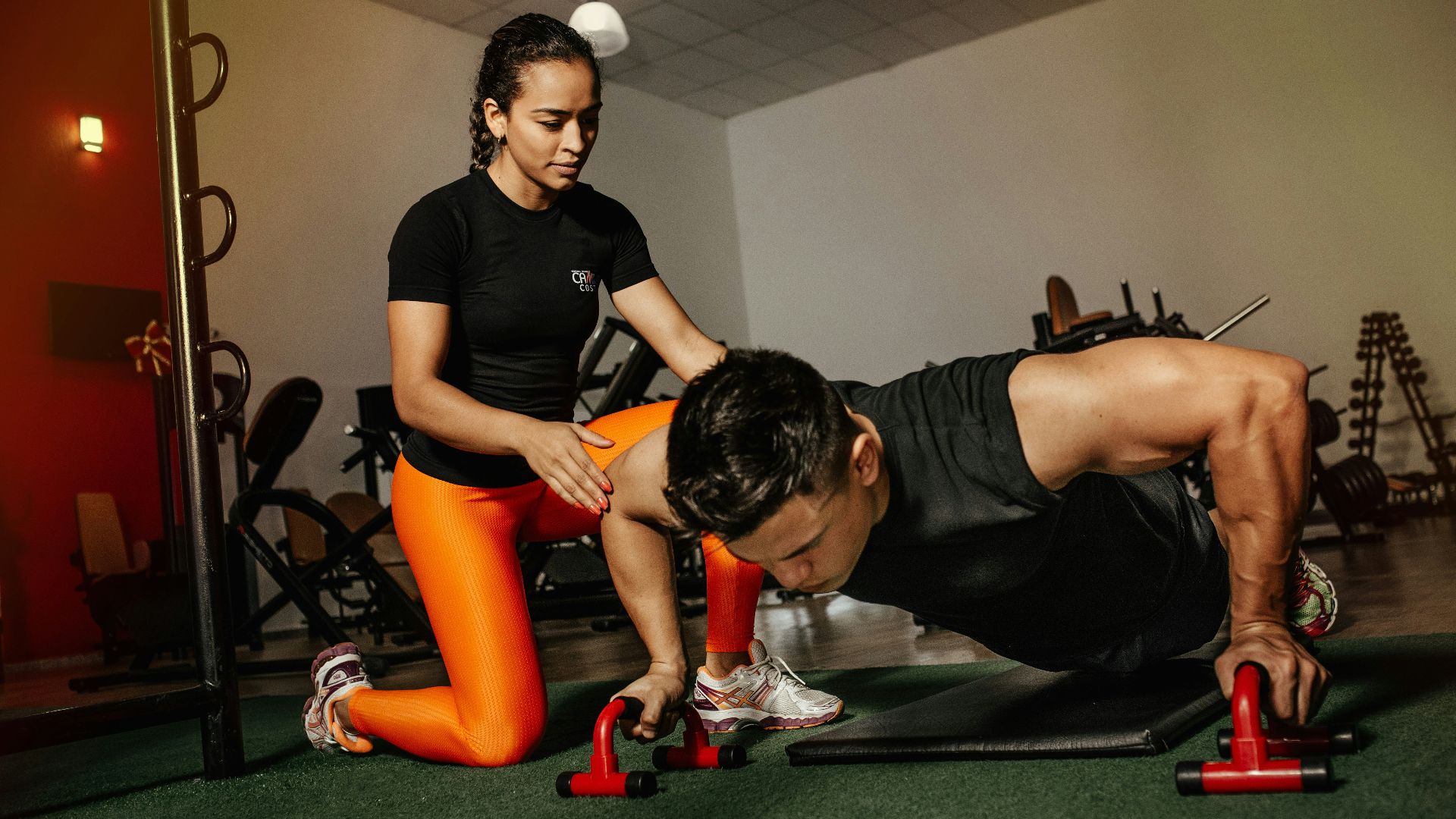 woman kneeling beside man