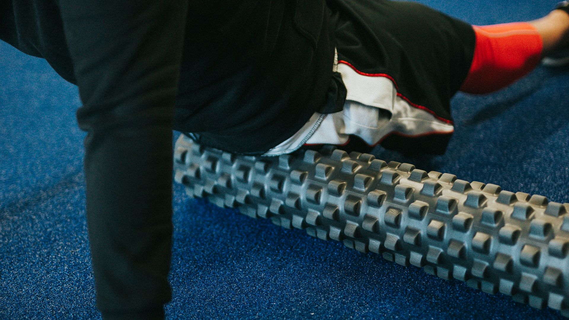 person in black pants and white shirt