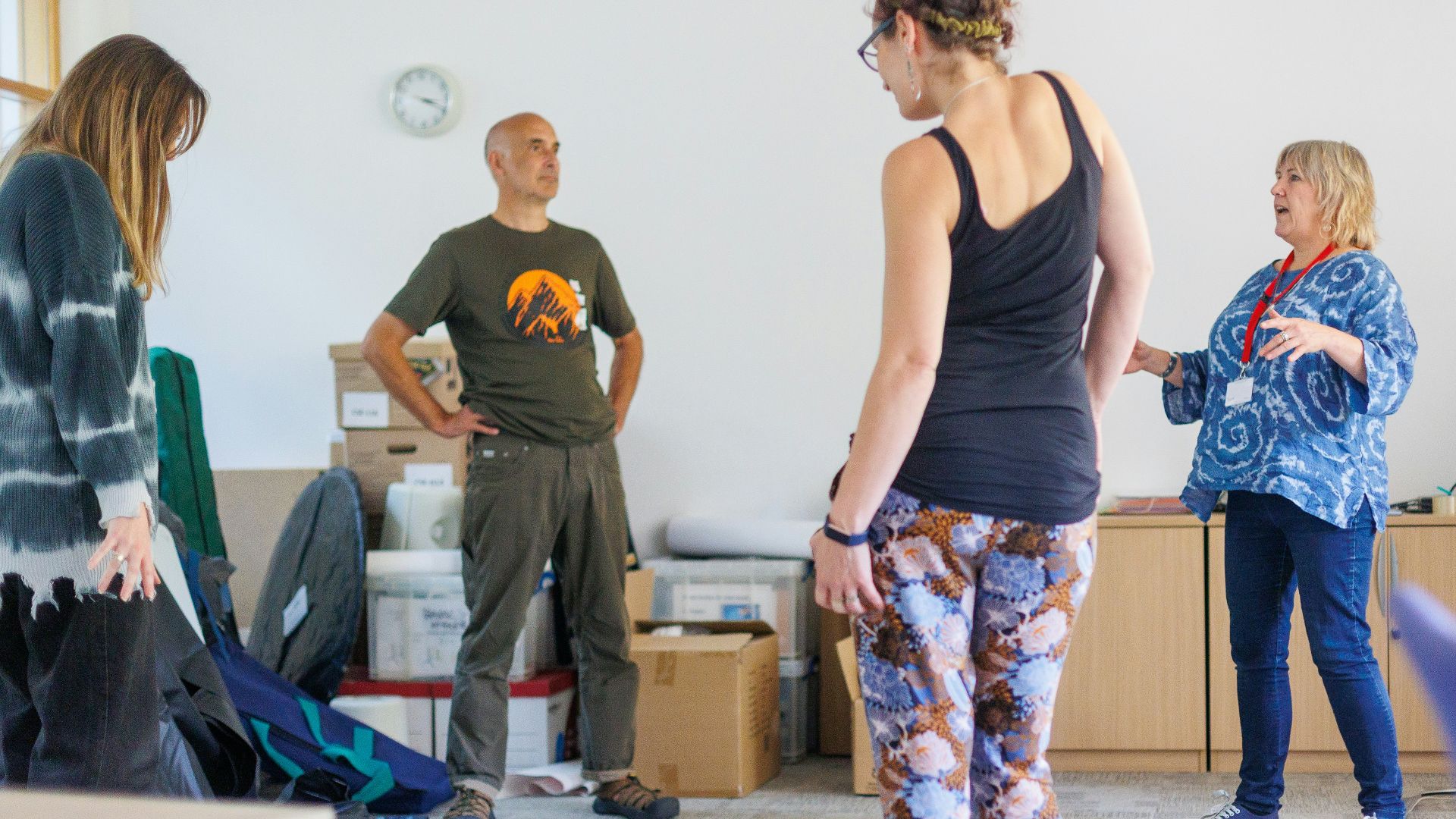 a group of people standing in a room