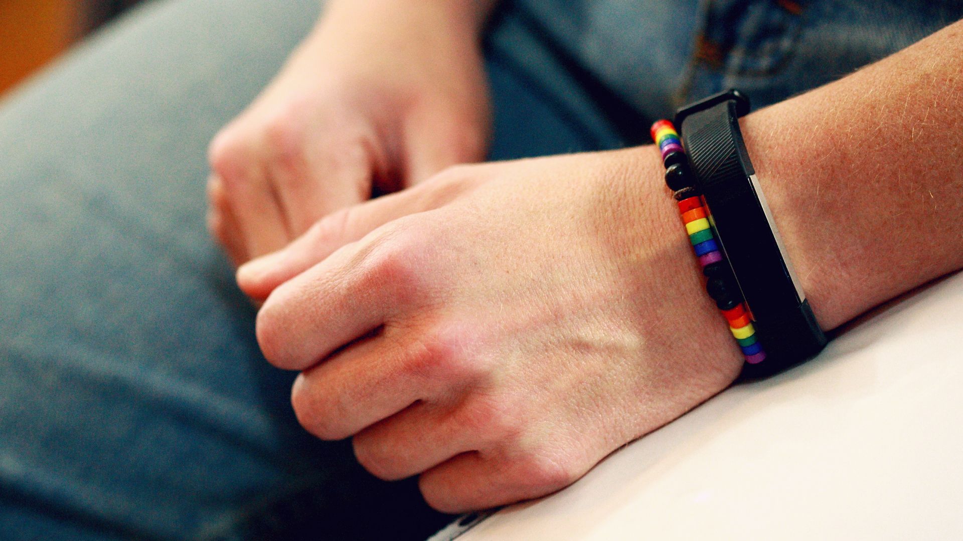 person wearing black smart watch