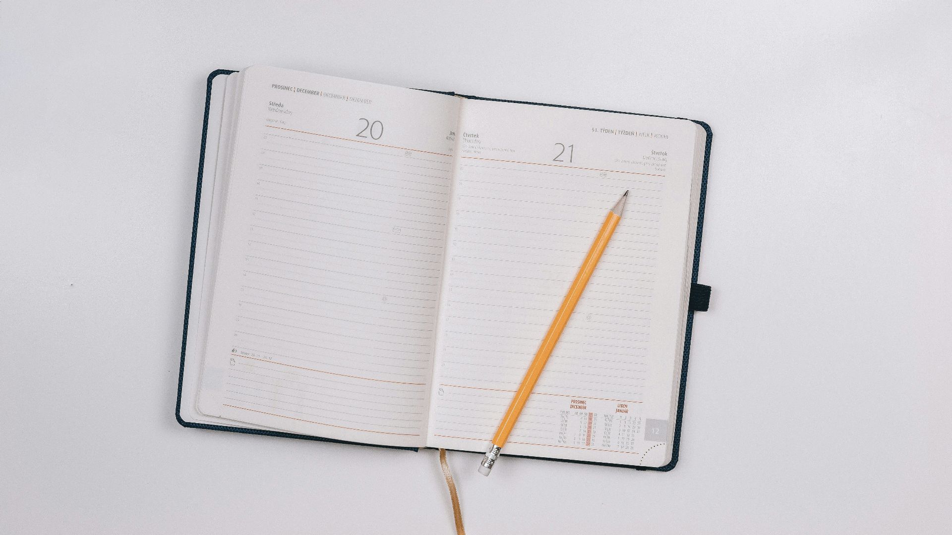 pencil on opened notebook