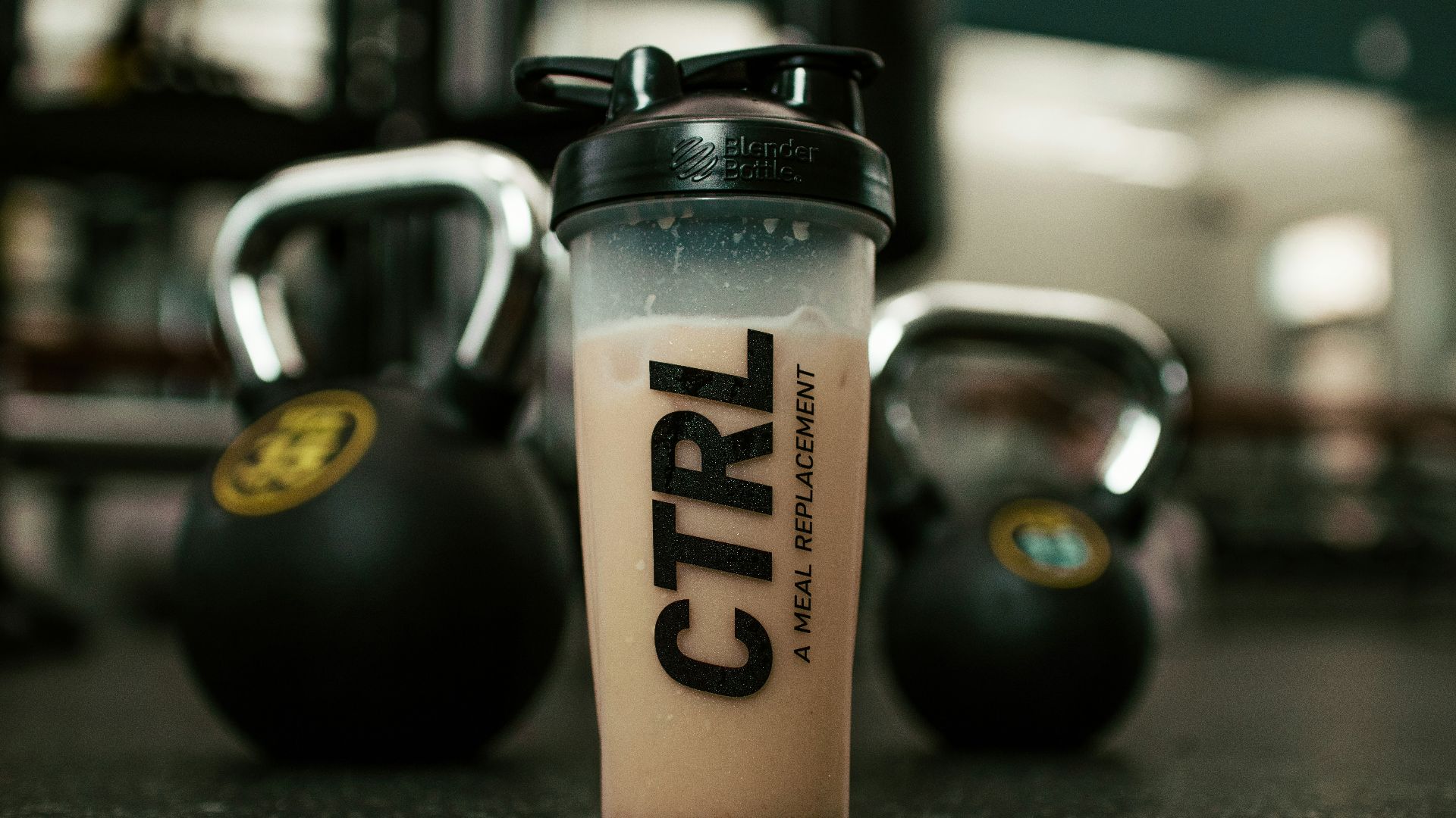 white and black plastic tumbler