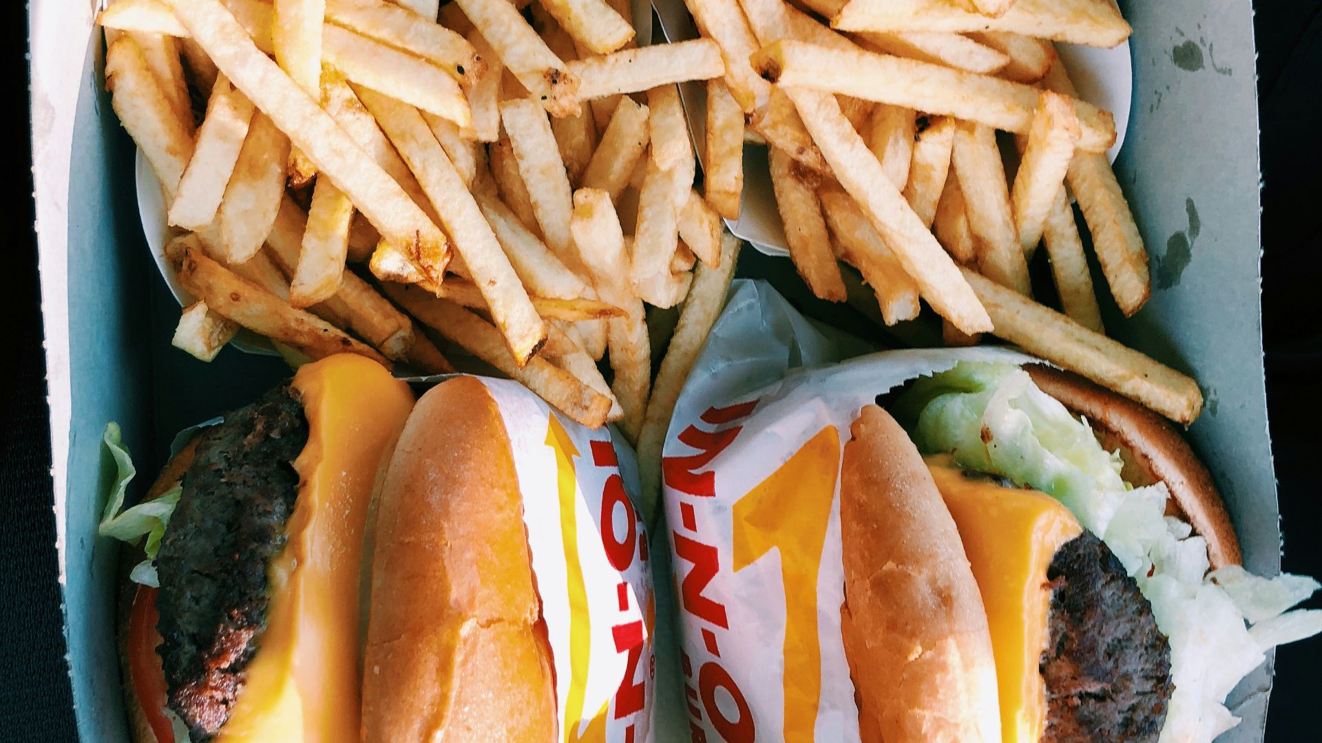 burgers and fries inside box