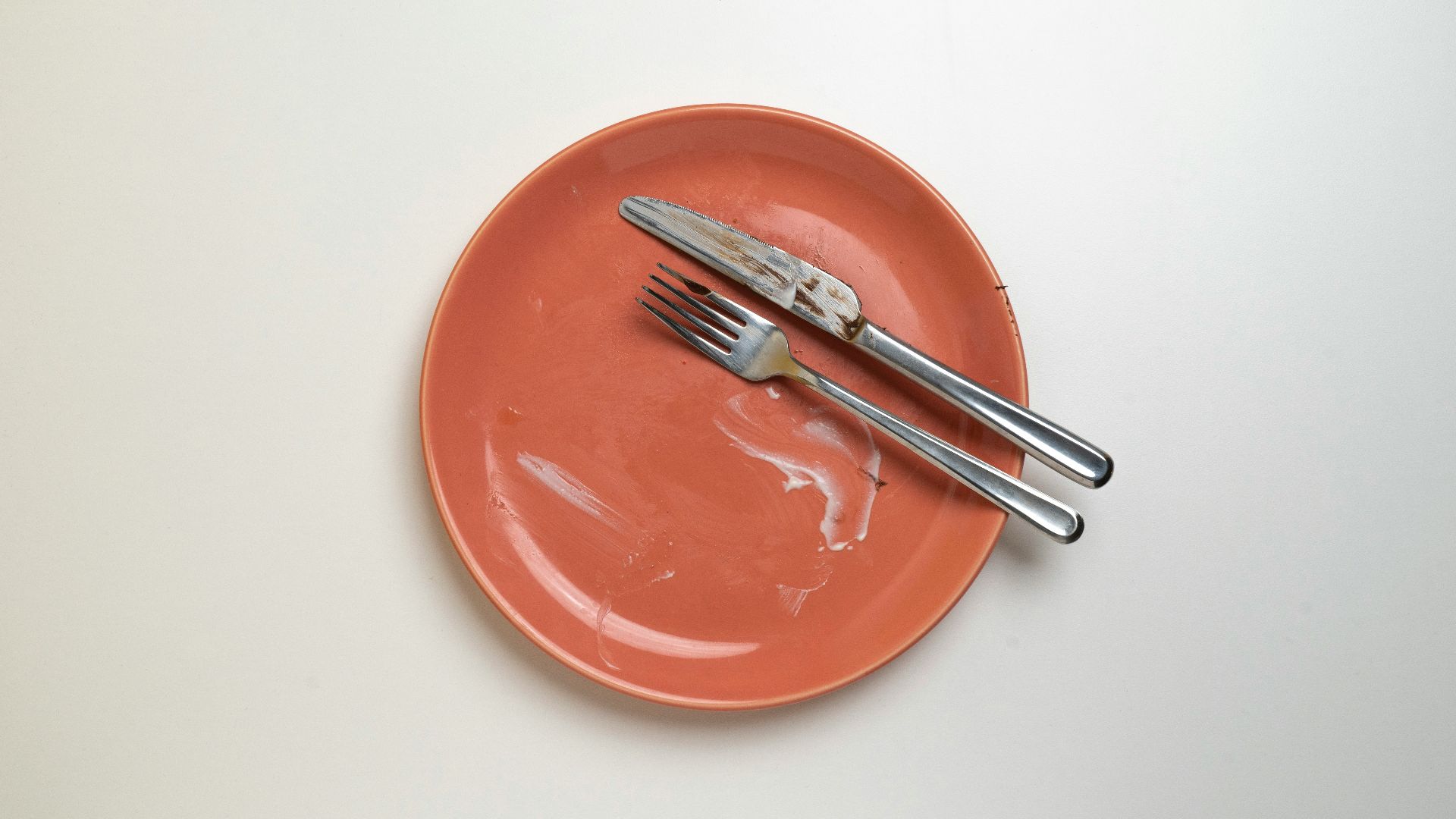 a plate with a fork and knife on it