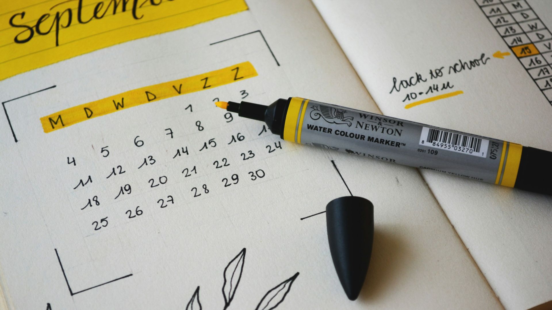 black marker on notebook