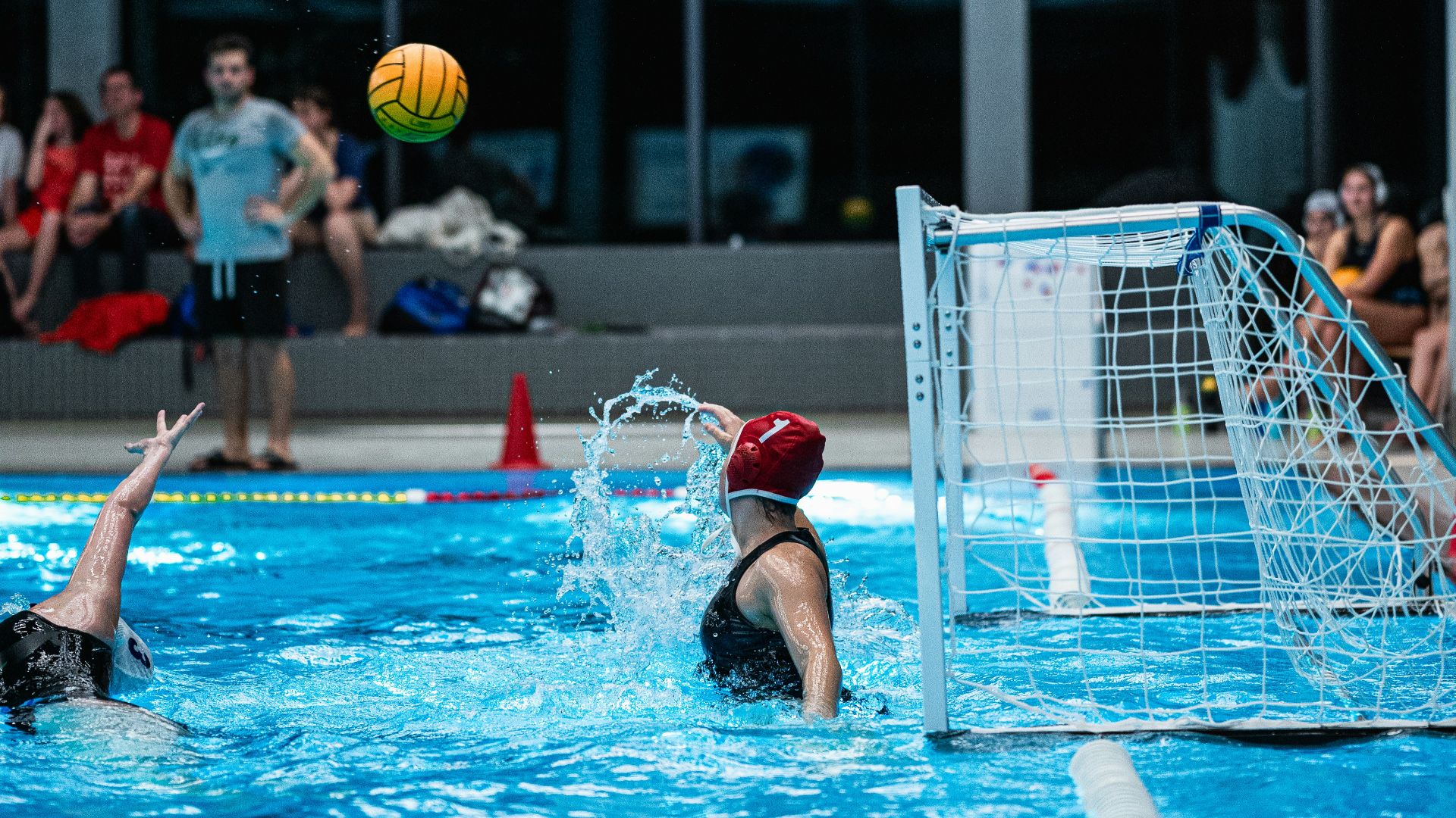 a group of people playing a game of water polo