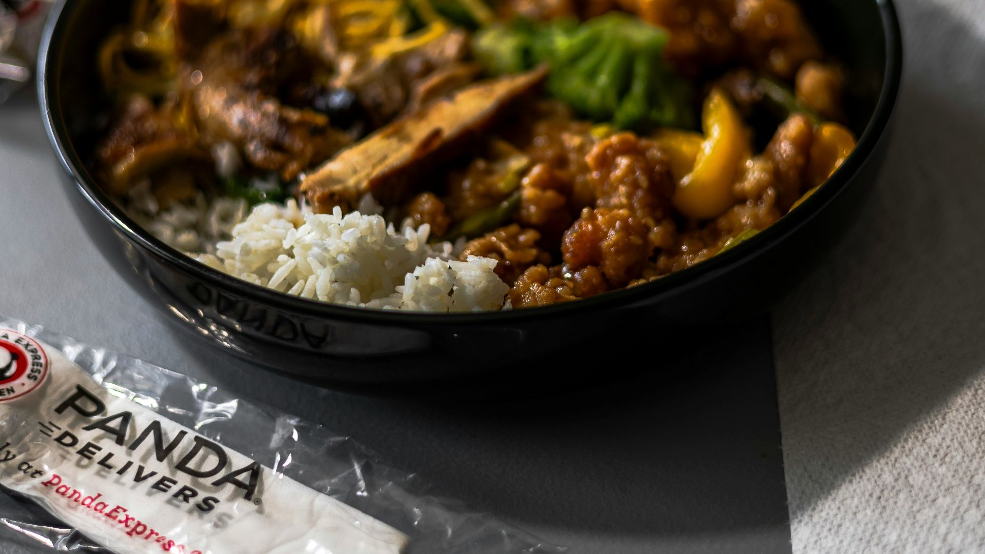 A bowl of food sitting on top of a table