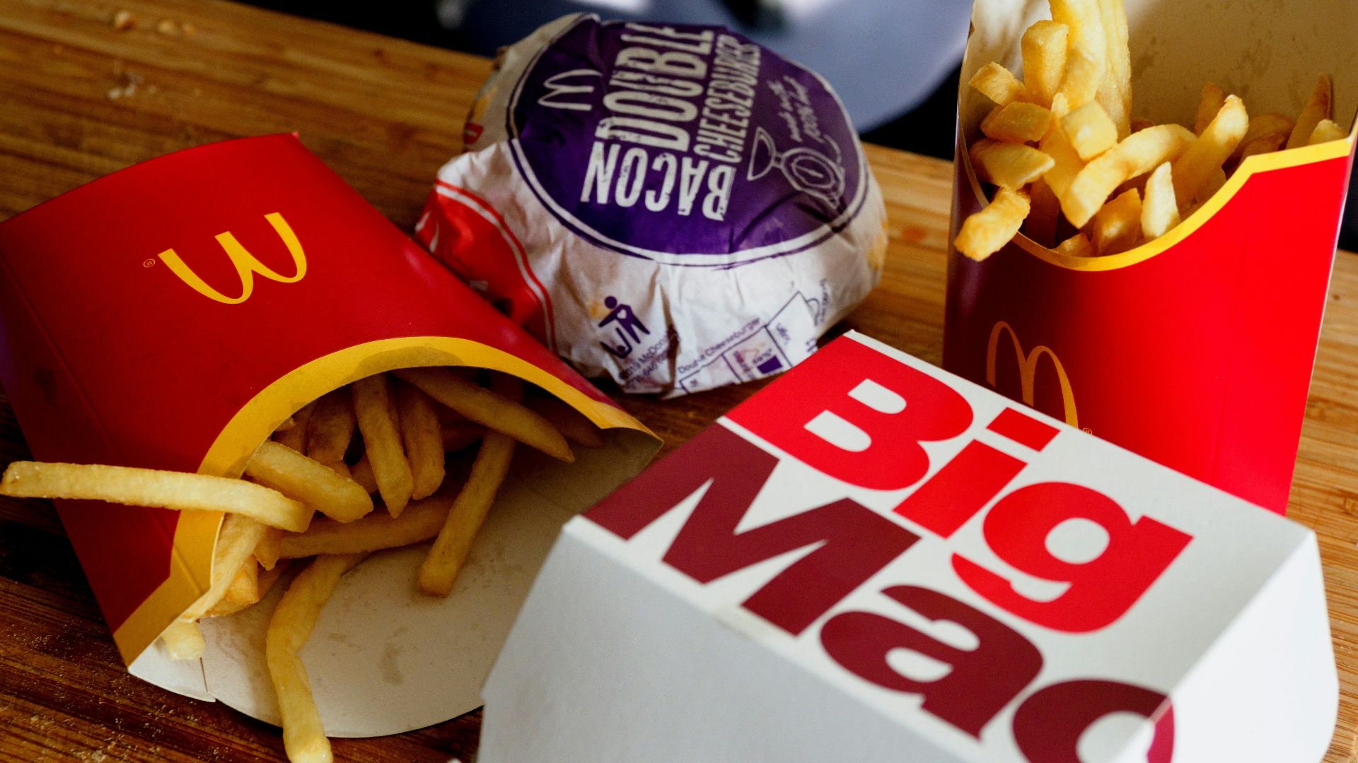 a sandwich sitting on top of a wooden table