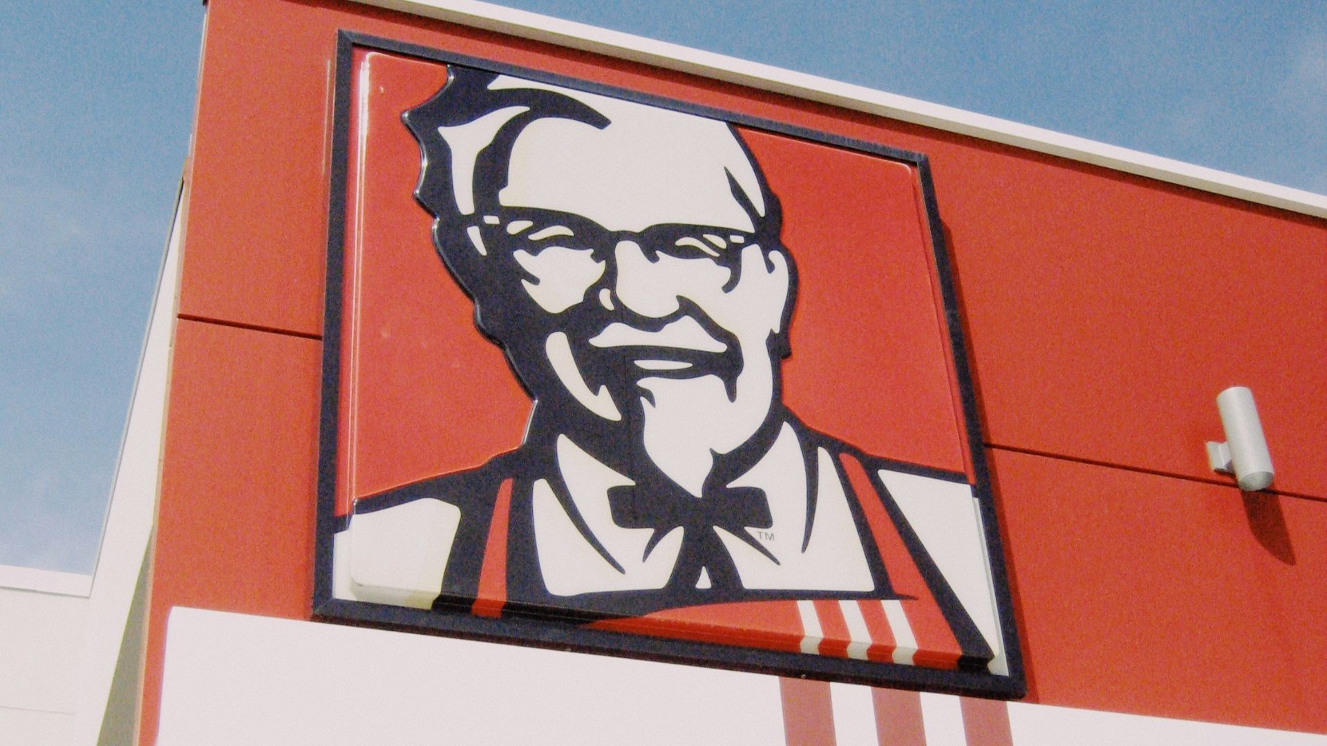 a picture of a man on the side of a building