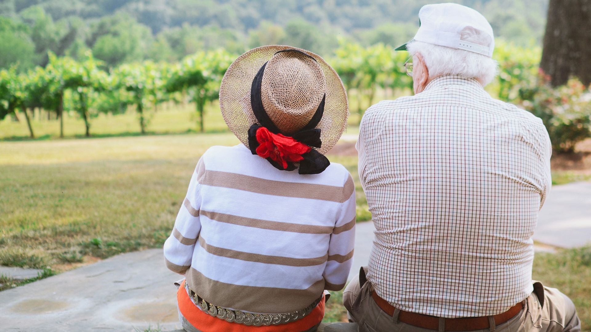 couple sitting on pathway