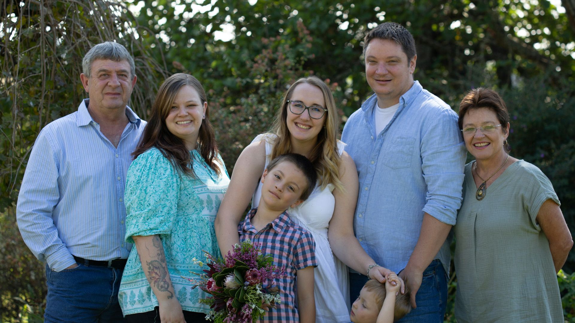 a group of people standing next to each other